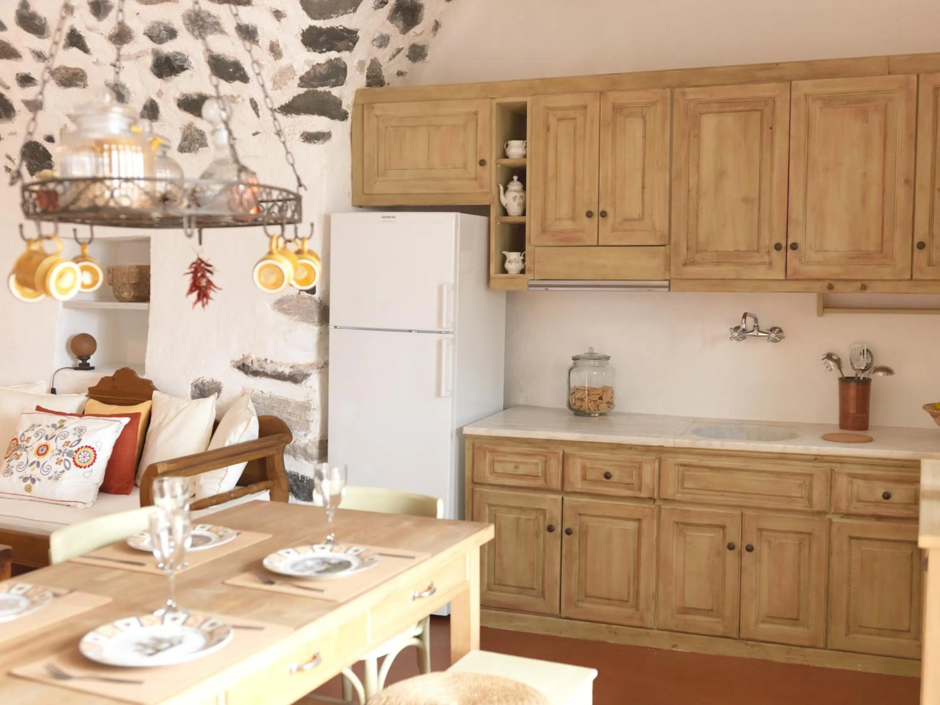 Kitchen or kitchenette in AFOURA HOUSES by K&K