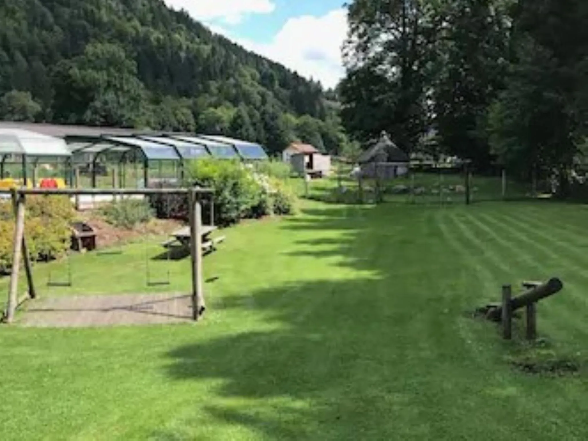Garden view in Gite Roche Des Ducs avec Piscine toute l'année, Spa, Sauna, Hammam