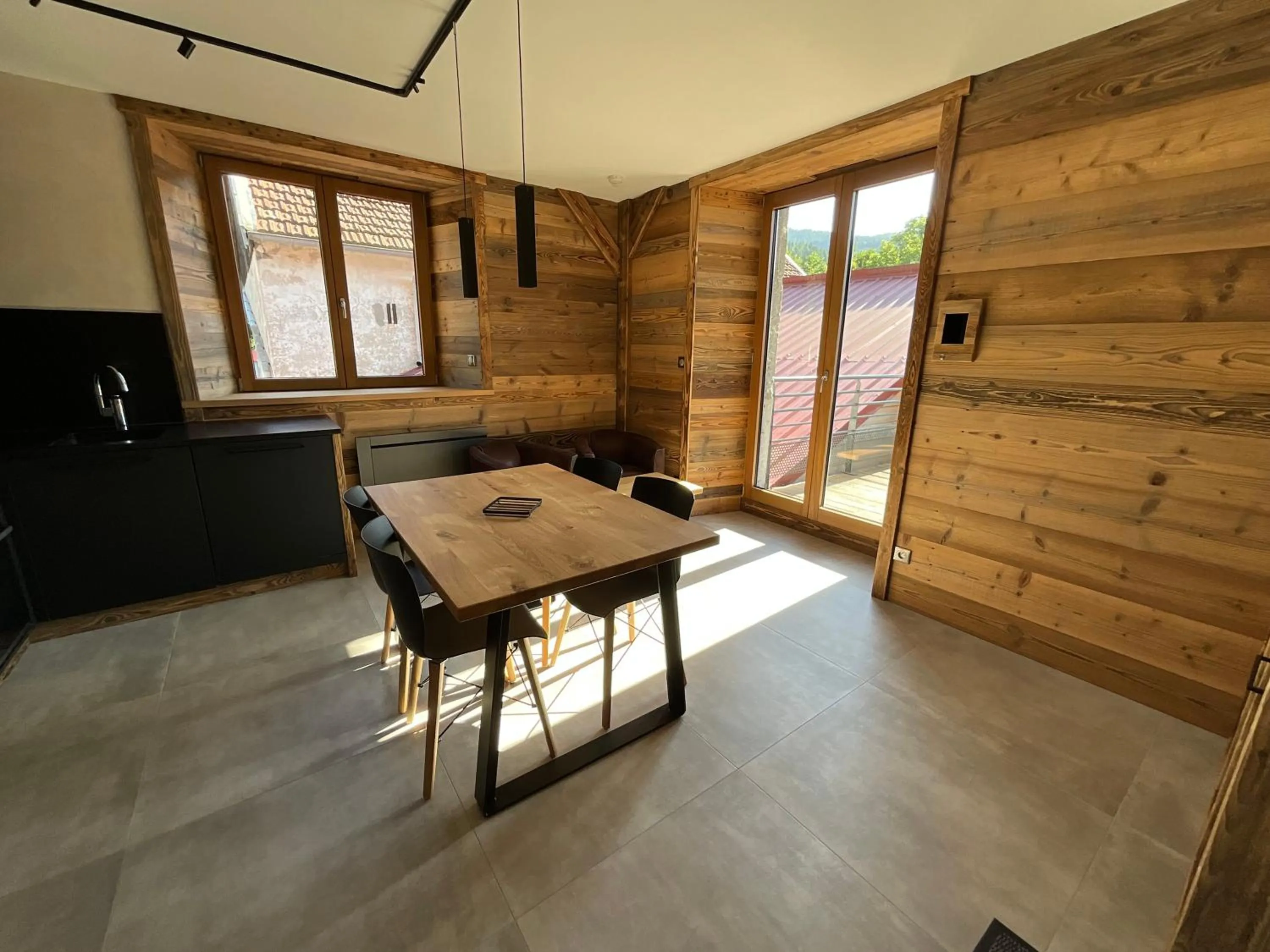 Living room in Gite Roche Des Ducs avec Piscine toute l'année, Spa, Sauna, Hammam