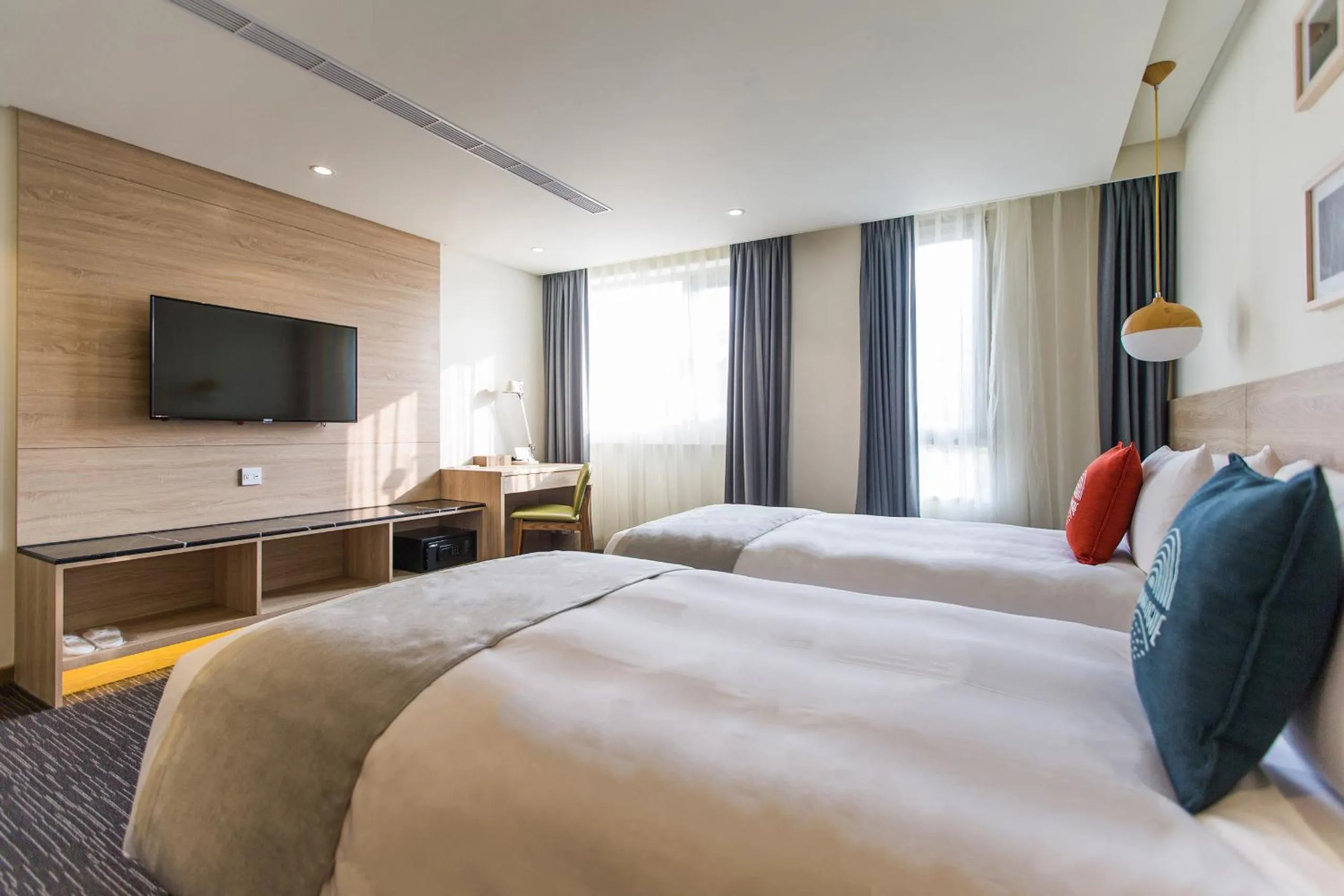 Photo of the whole room, Bed in Sun Dialogue Hotel-By Cosmos Creation