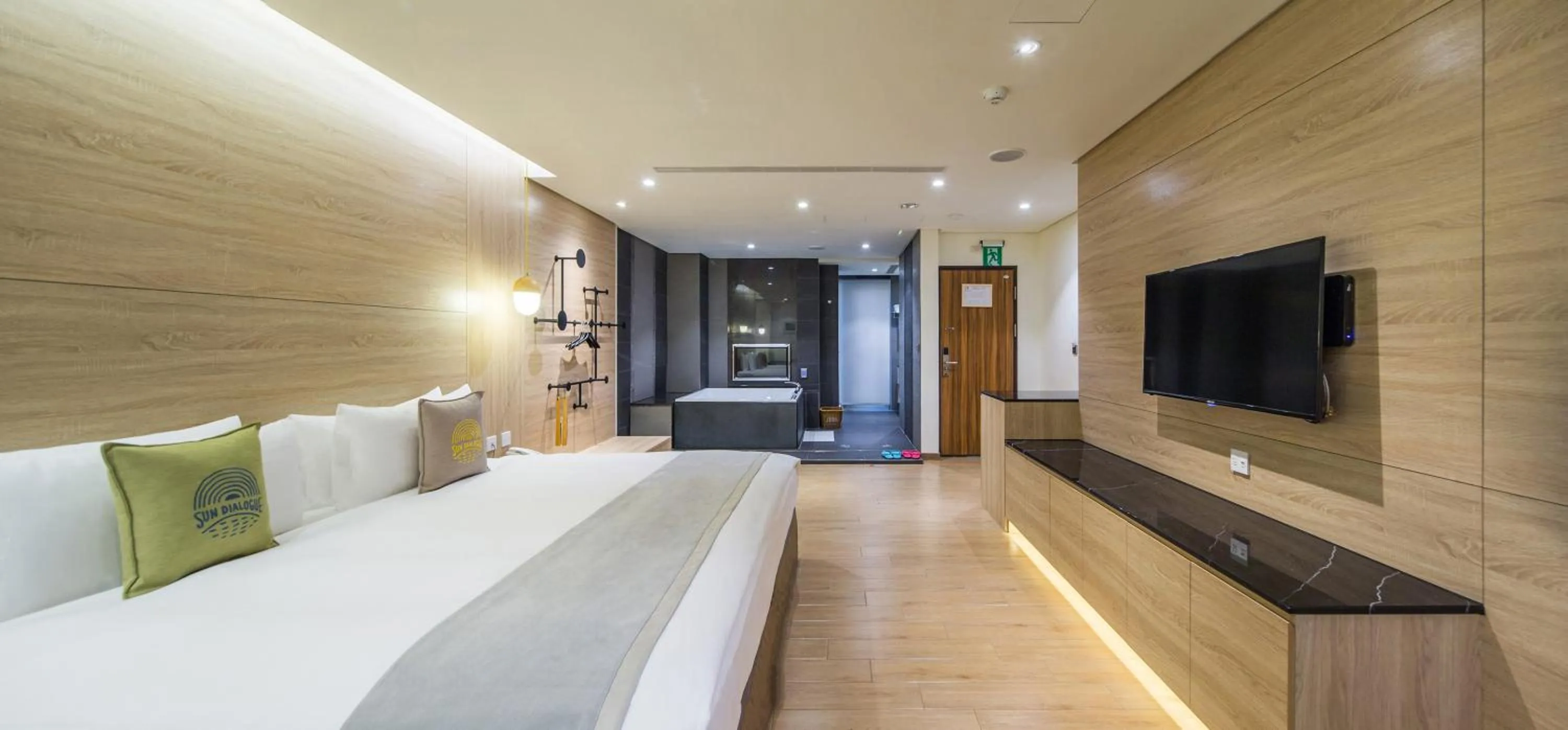 Photo of the whole room, Bed in Sun Dialogue Hotel-By Cosmos Creation