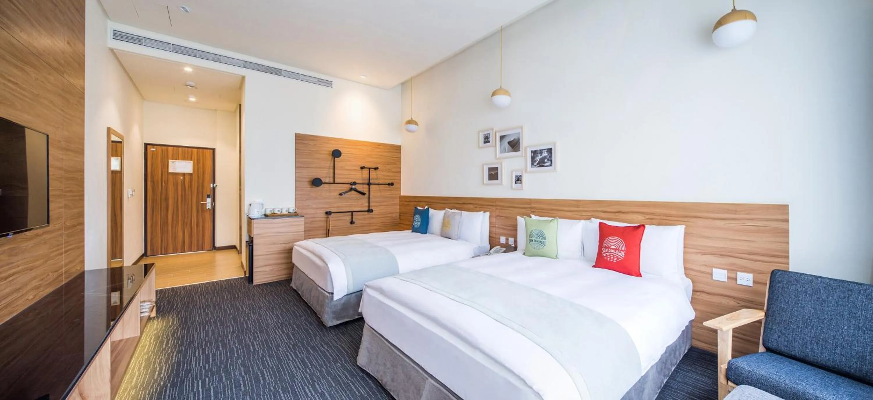 Photo of the whole room, Bed in Sun Dialogue Hotel-By Cosmos Creation