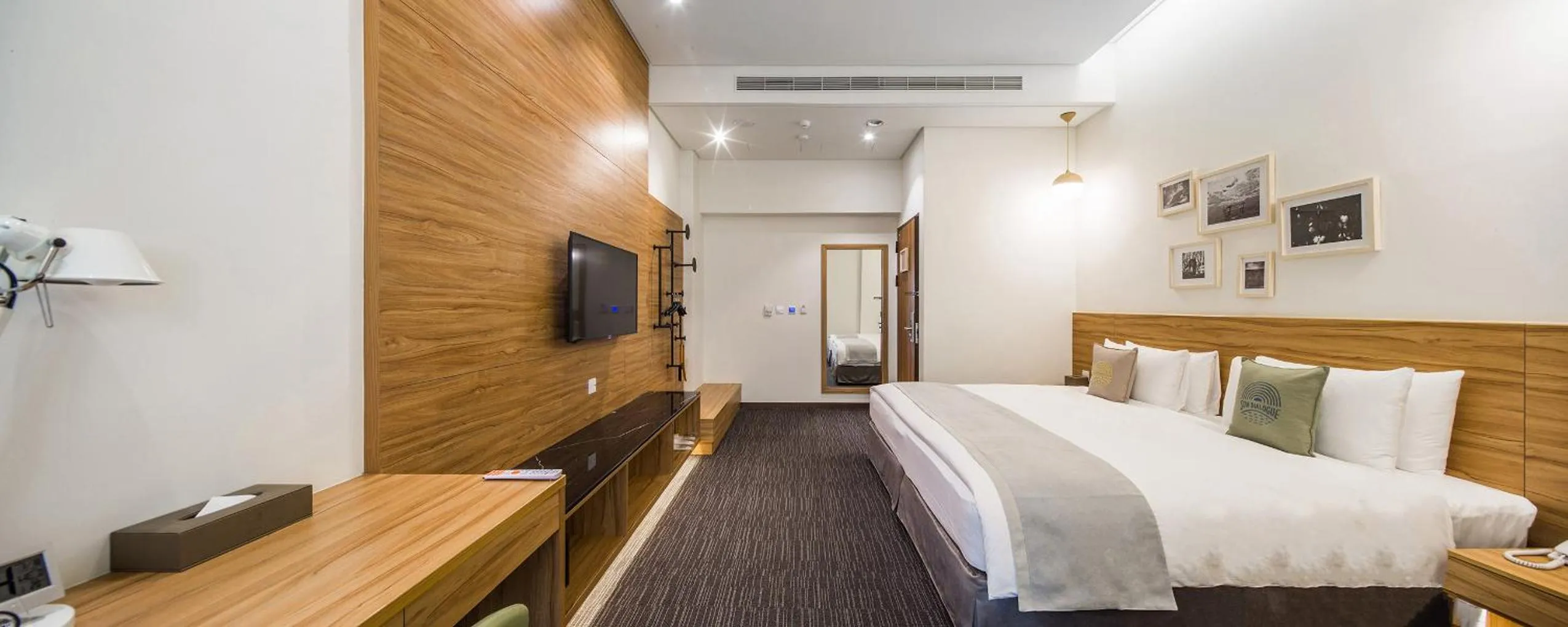 Photo of the whole room, Bed in Sun Dialogue Hotel-By Cosmos Creation