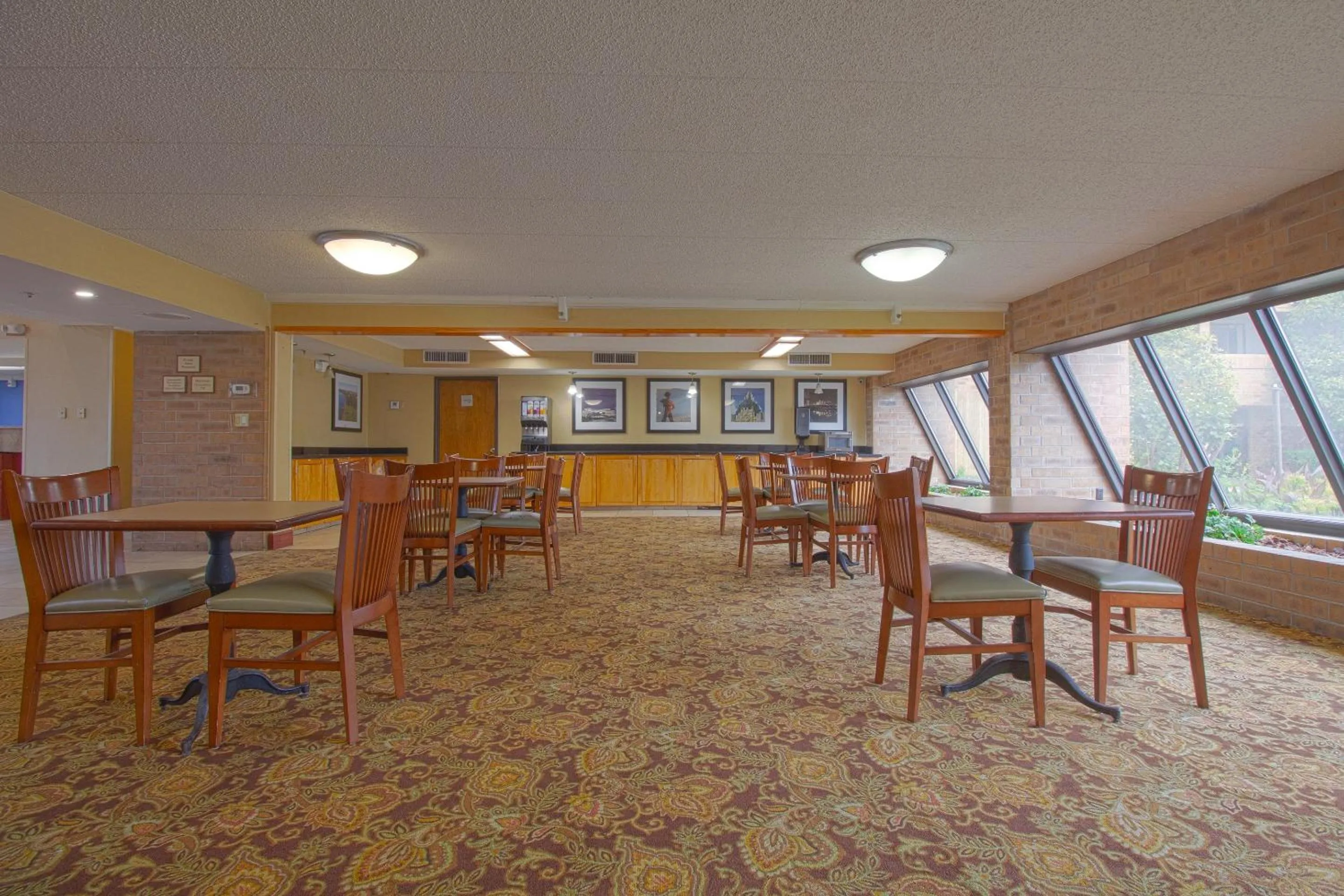 Dining area in Tulsa Square Hotel Central, I-44 By OYO
