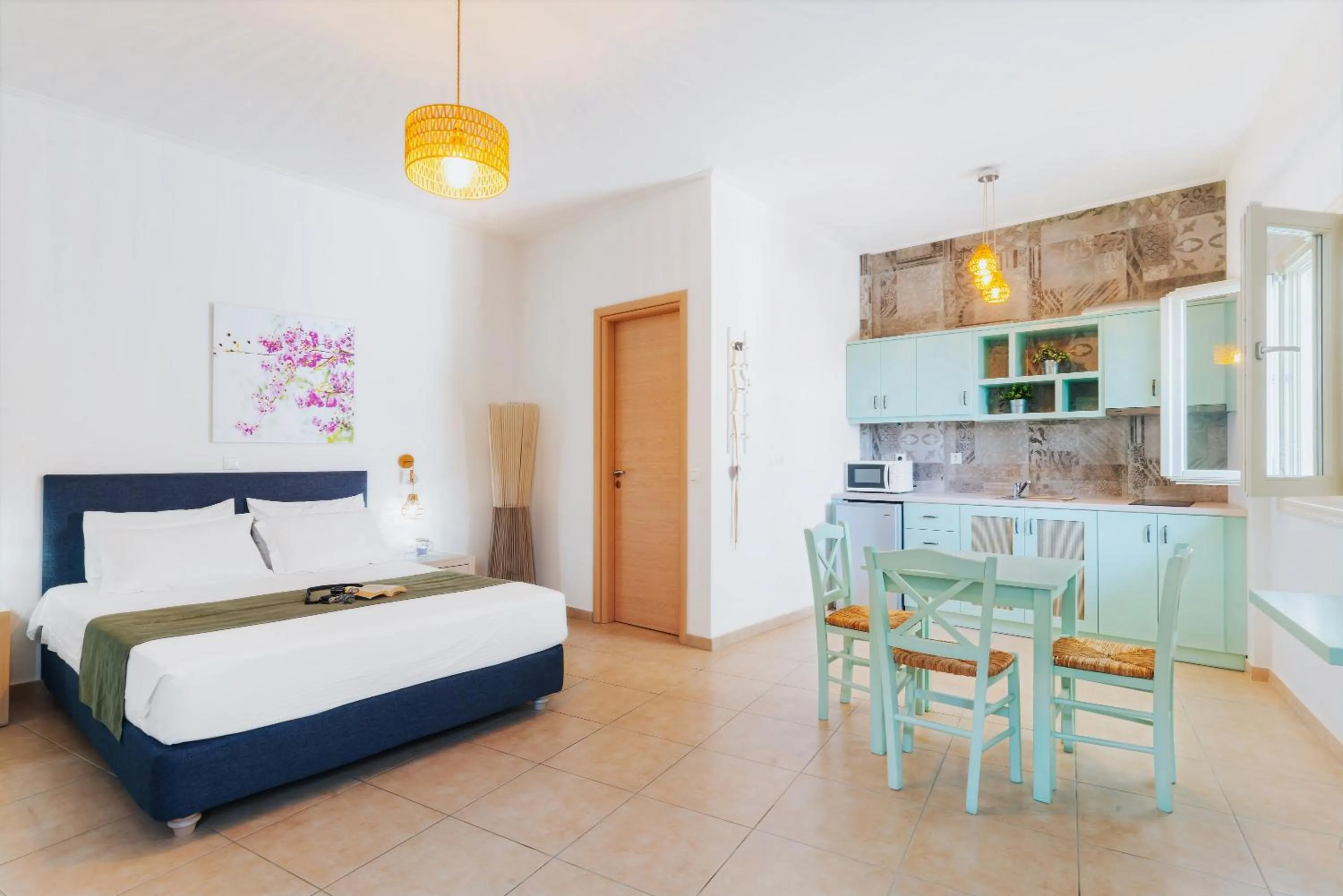 Bed in Aelia Apartments & Suites