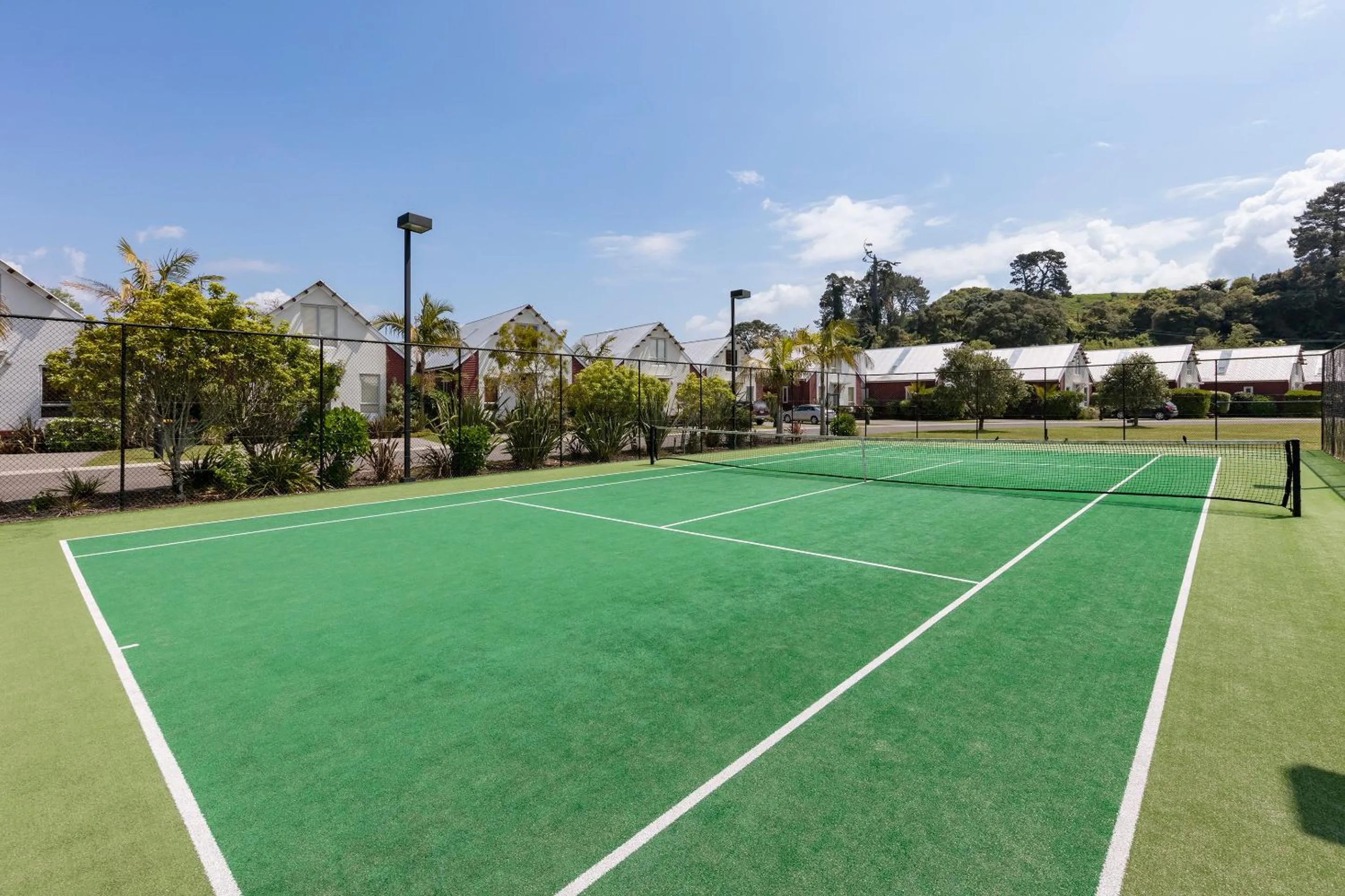Tennis court in Ramada Resort By Wyndham Rotorua Marama
