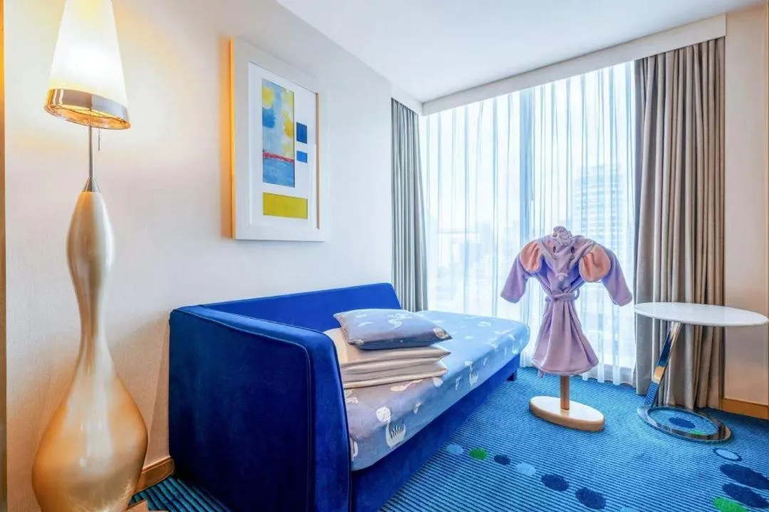 Bed in Renaissance Shanghai Yu Garden Hotel on the Bund