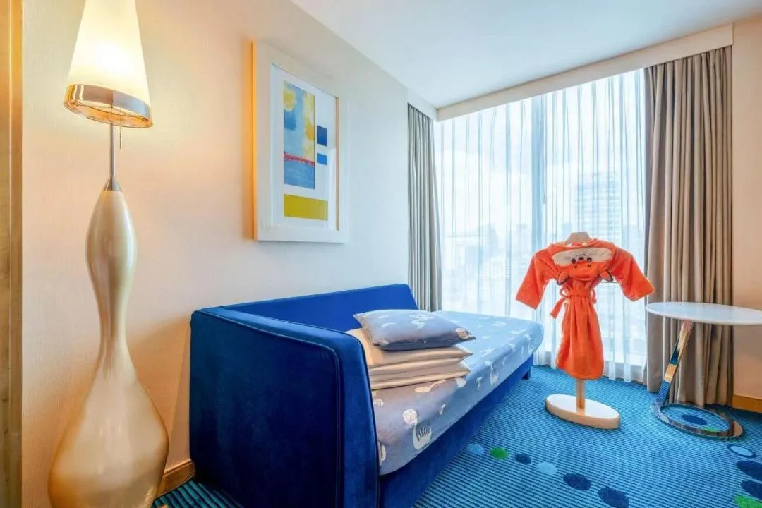 Bed in Renaissance Shanghai Yu Garden Hotel on the Bund