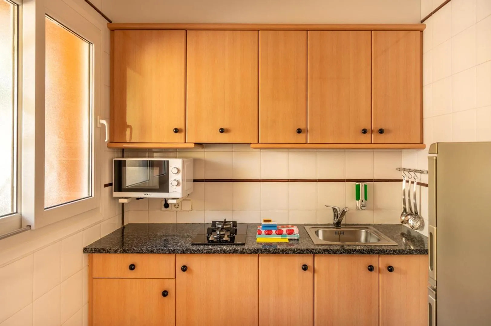 kitchen in Albamar Apartaments