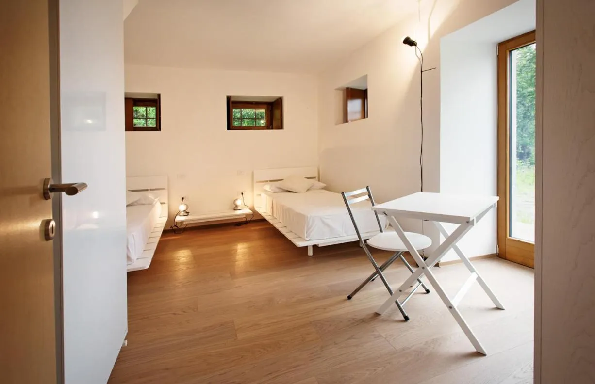 Bed in Albergo Diffuso Tolmezzo