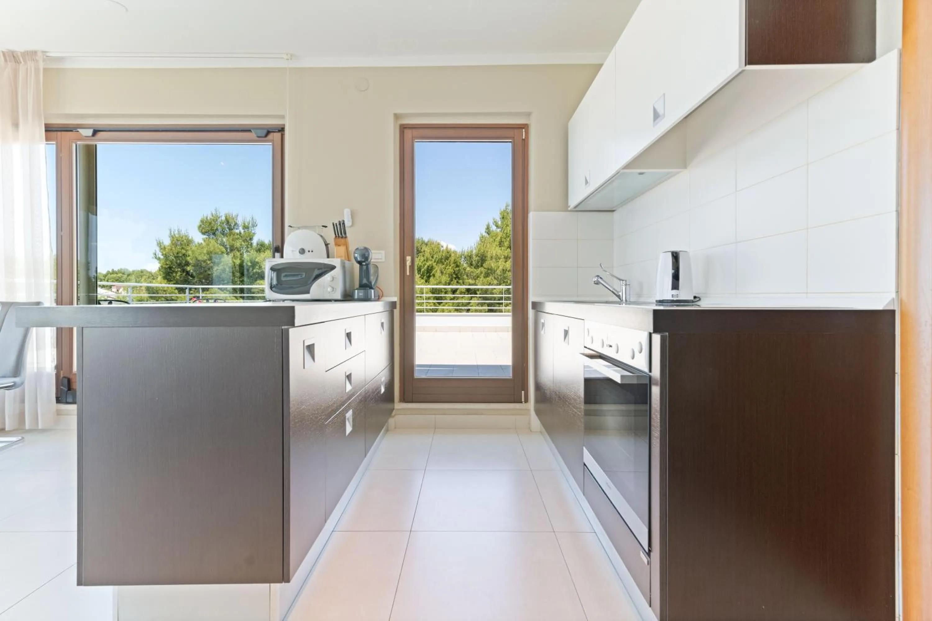 Kitchen or kitchenette in The Residence Aparthotel