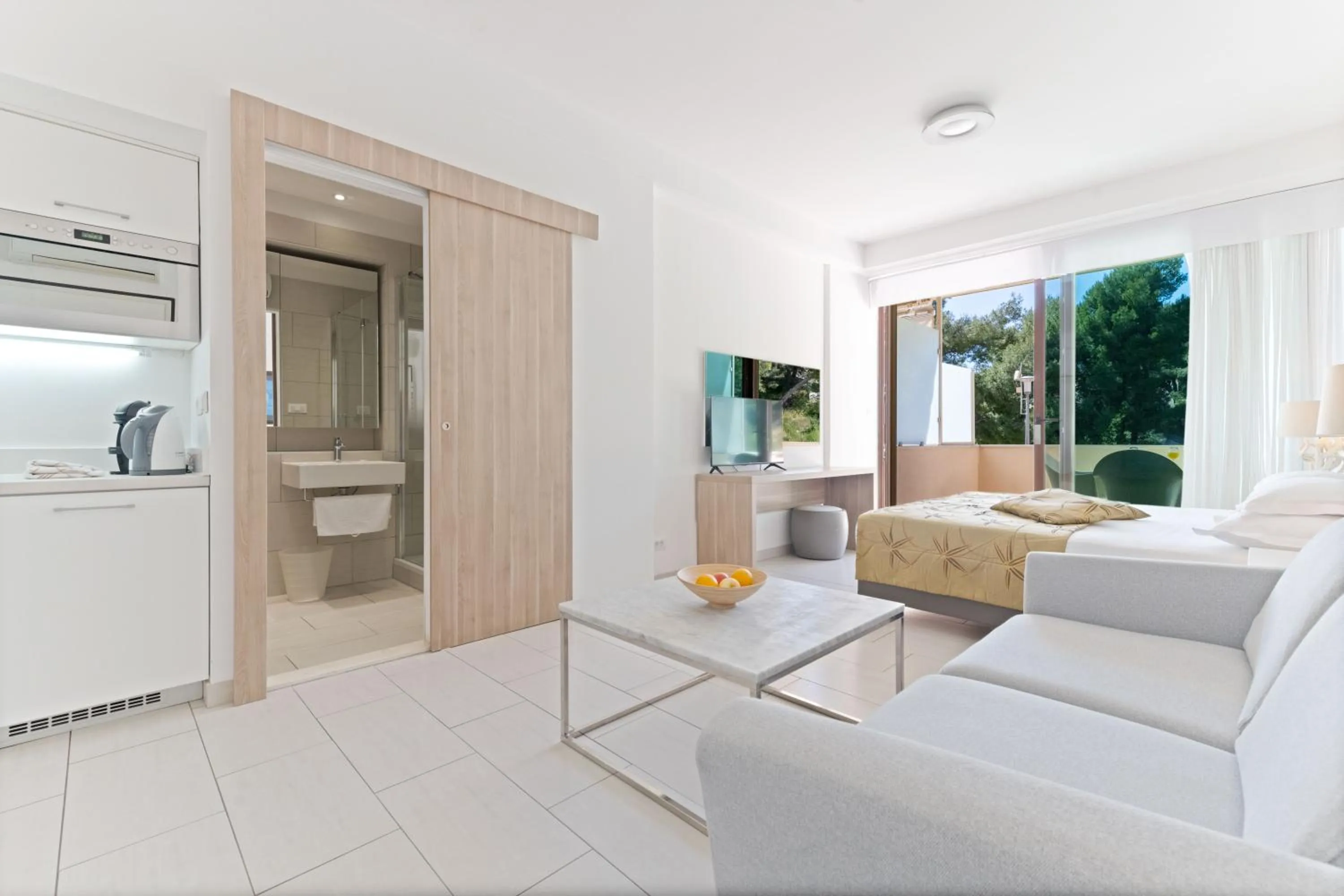 Bed in The Residence Aparthotel