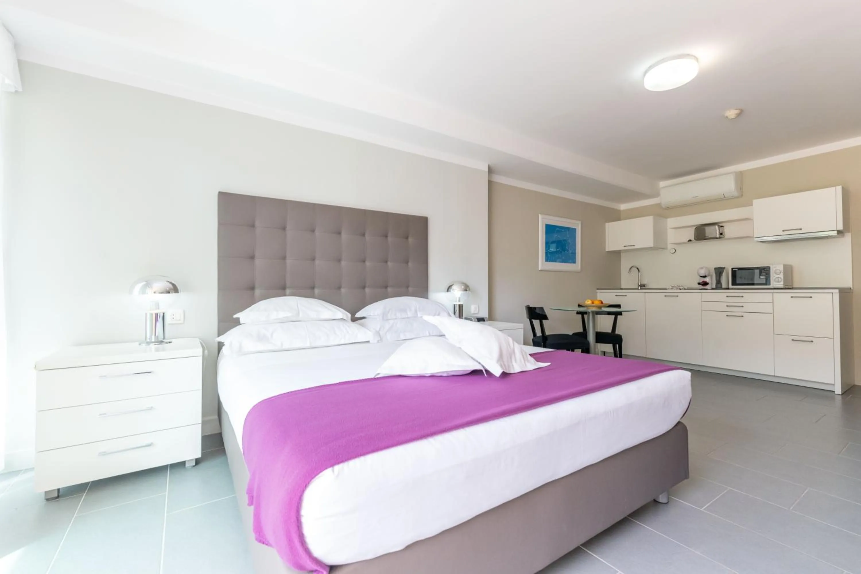 Bed in The Residence Aparthotel