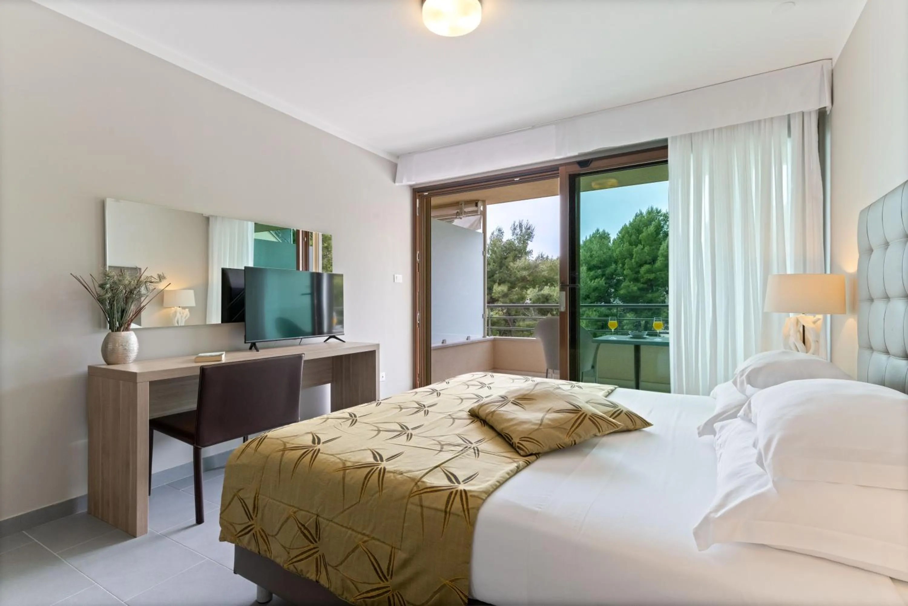 Bed in The Residence Aparthotel