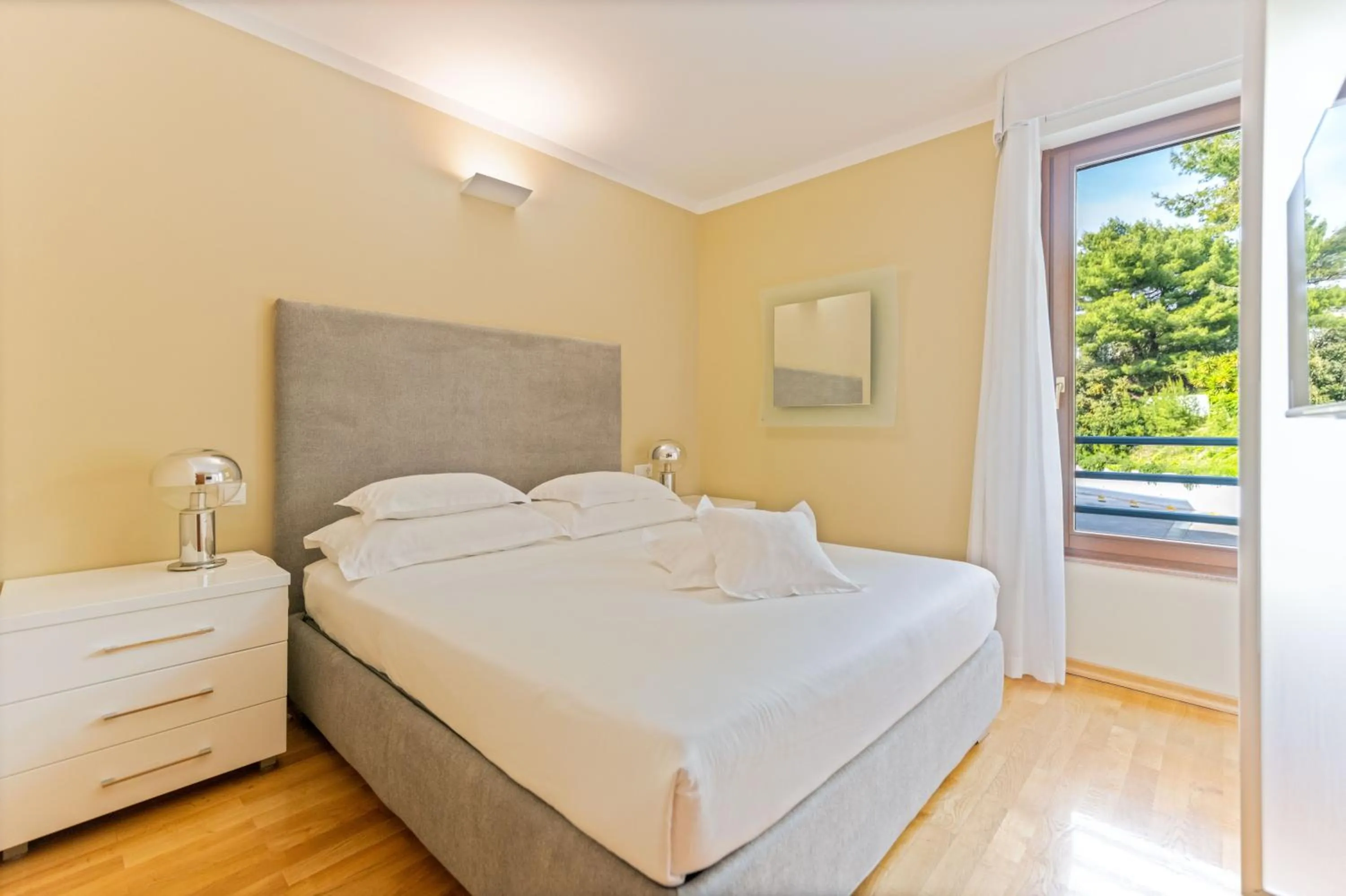 Bed in The Residence Aparthotel