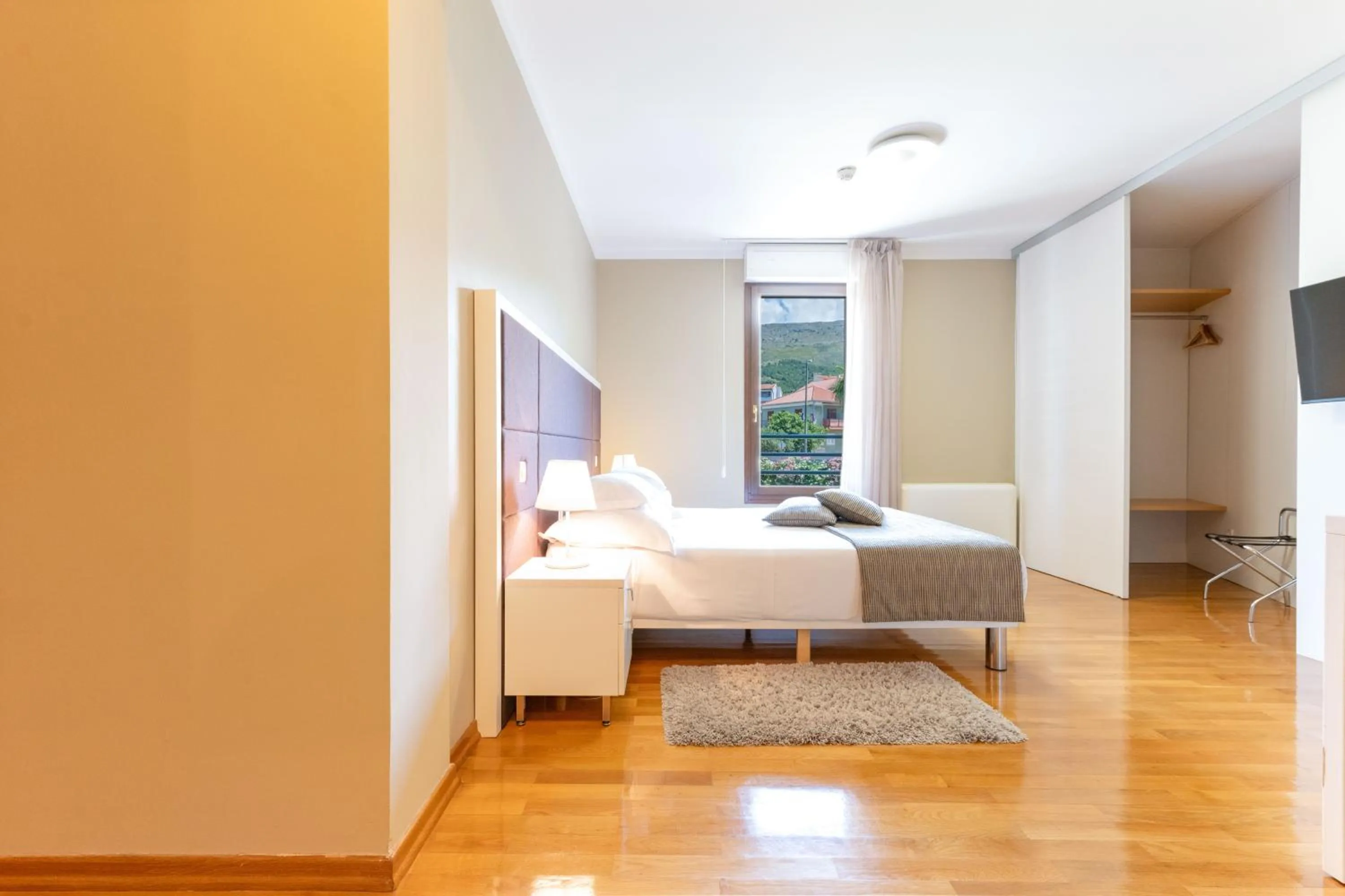 Bed in The Residence Aparthotel