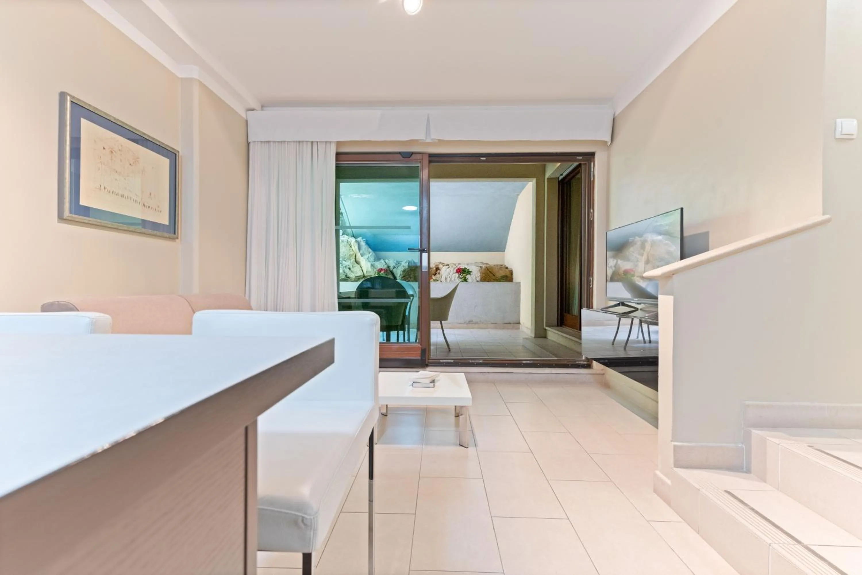 Living room, Bed in The Residence Aparthotel