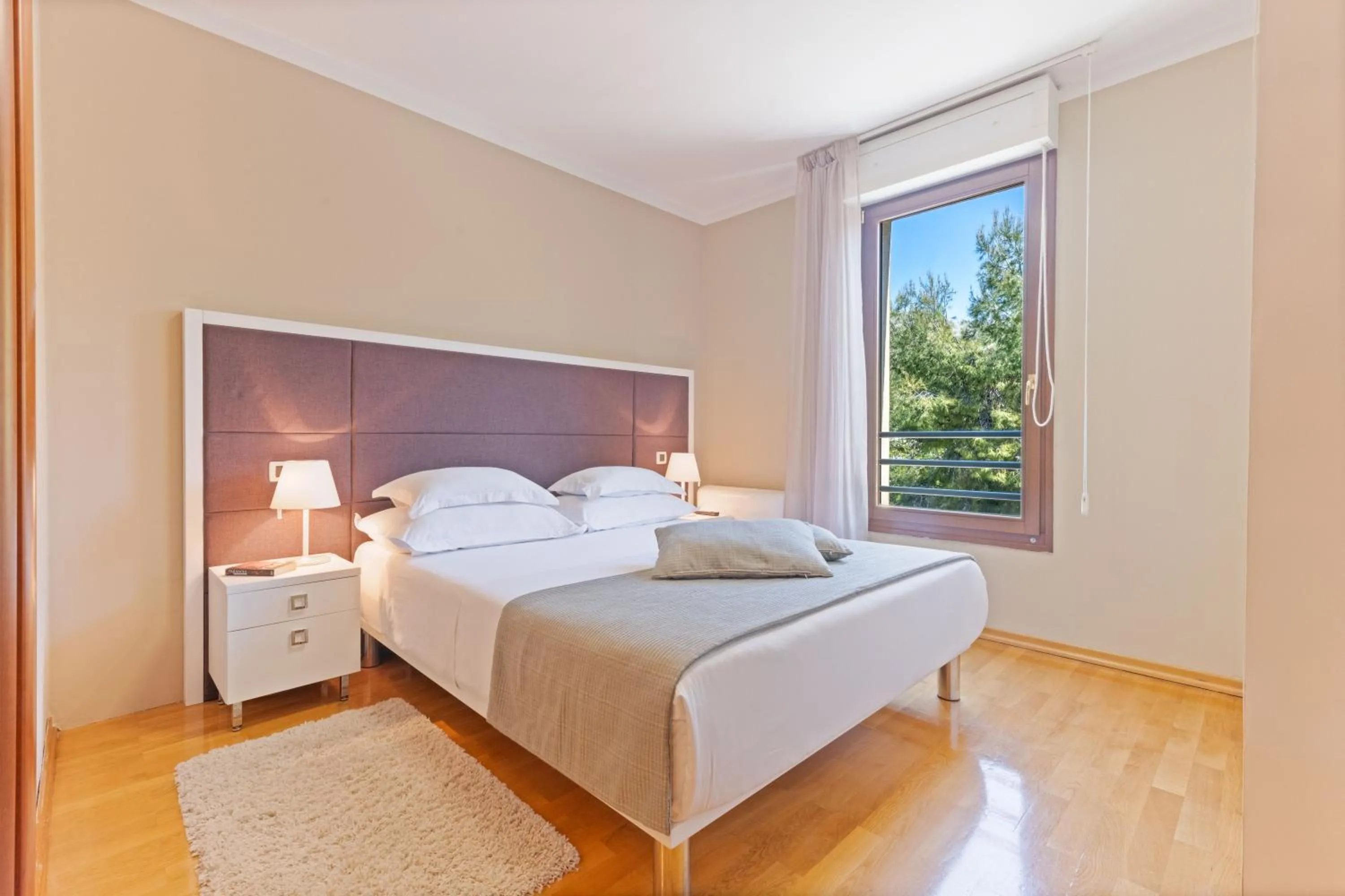 Bed in The Residence Aparthotel