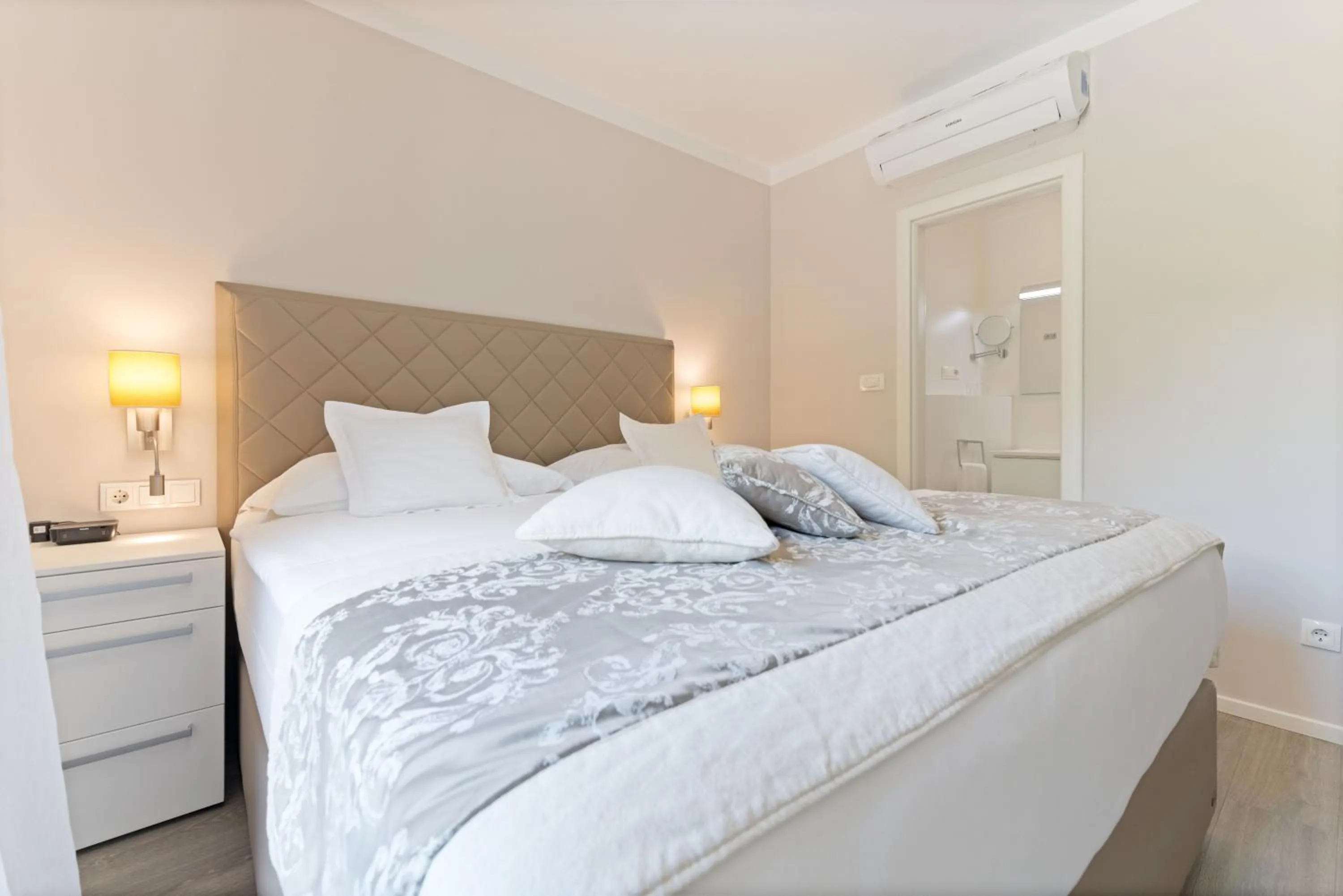 Bed in The Residence Aparthotel