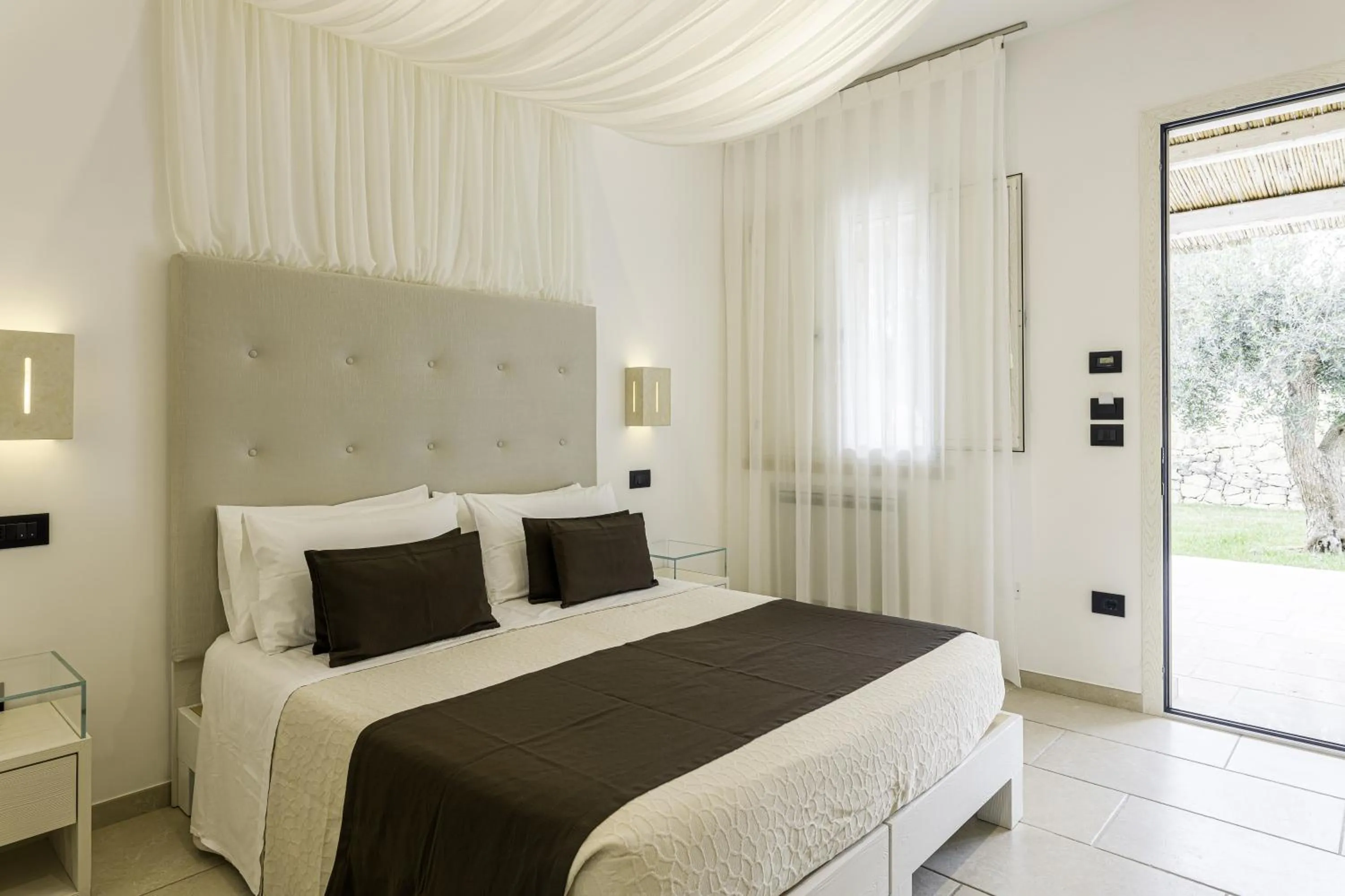 Bed in Masseria Muntibianchi AgriResort Restaurant & SPA