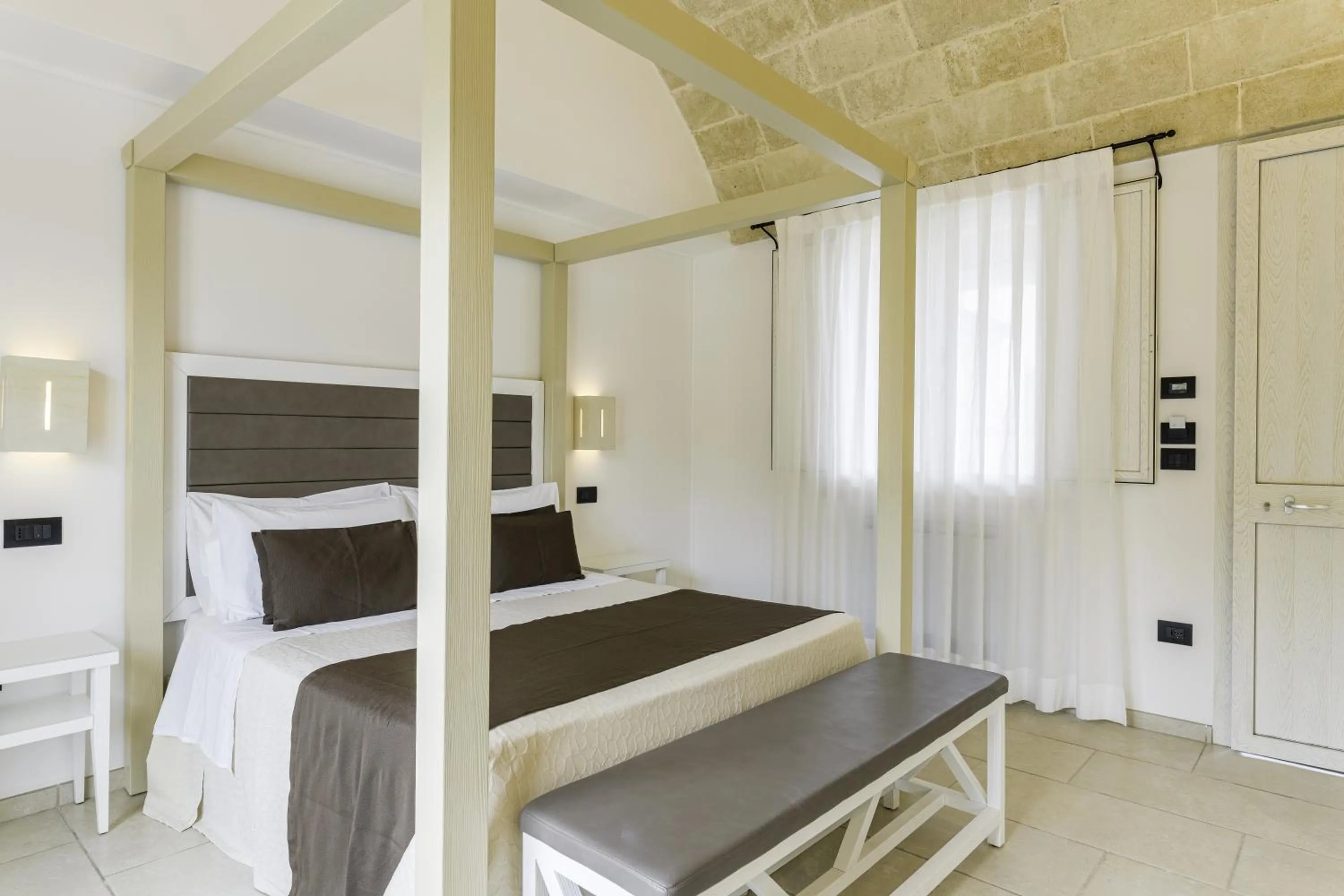 Bed in Masseria Muntibianchi AgriResort Restaurant & SPA