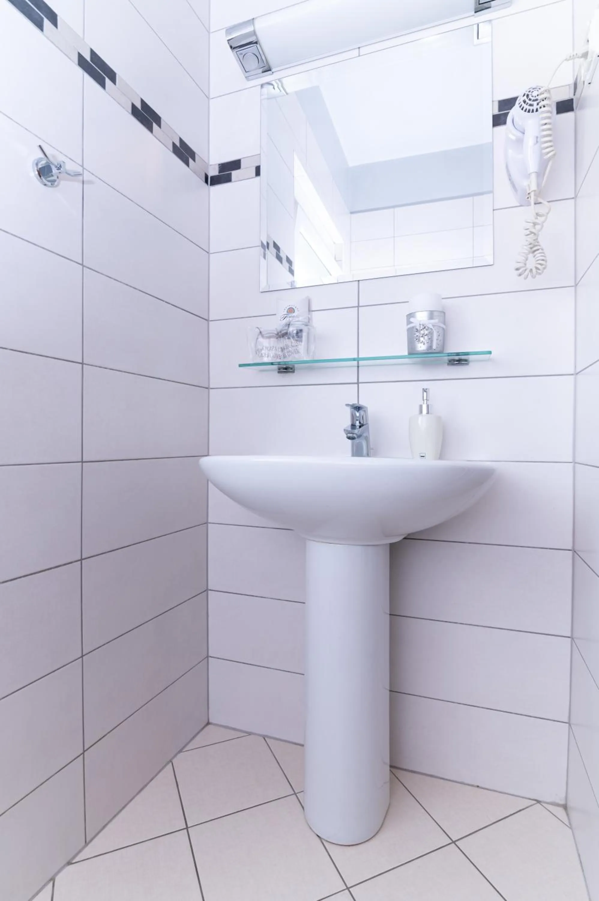 Bathroom in Tamaris Rooms