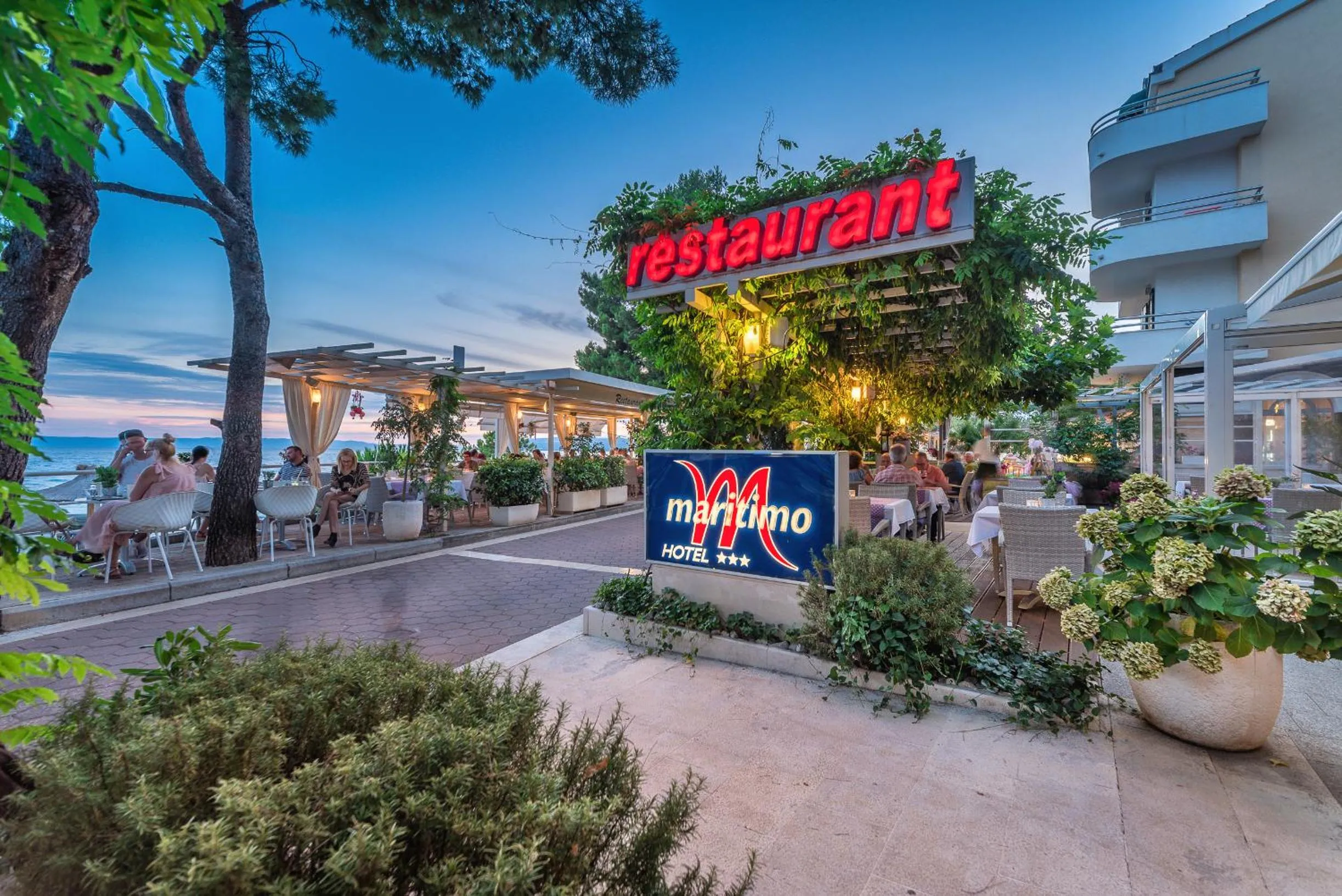 Property logo or sign in Hotel Maritimo