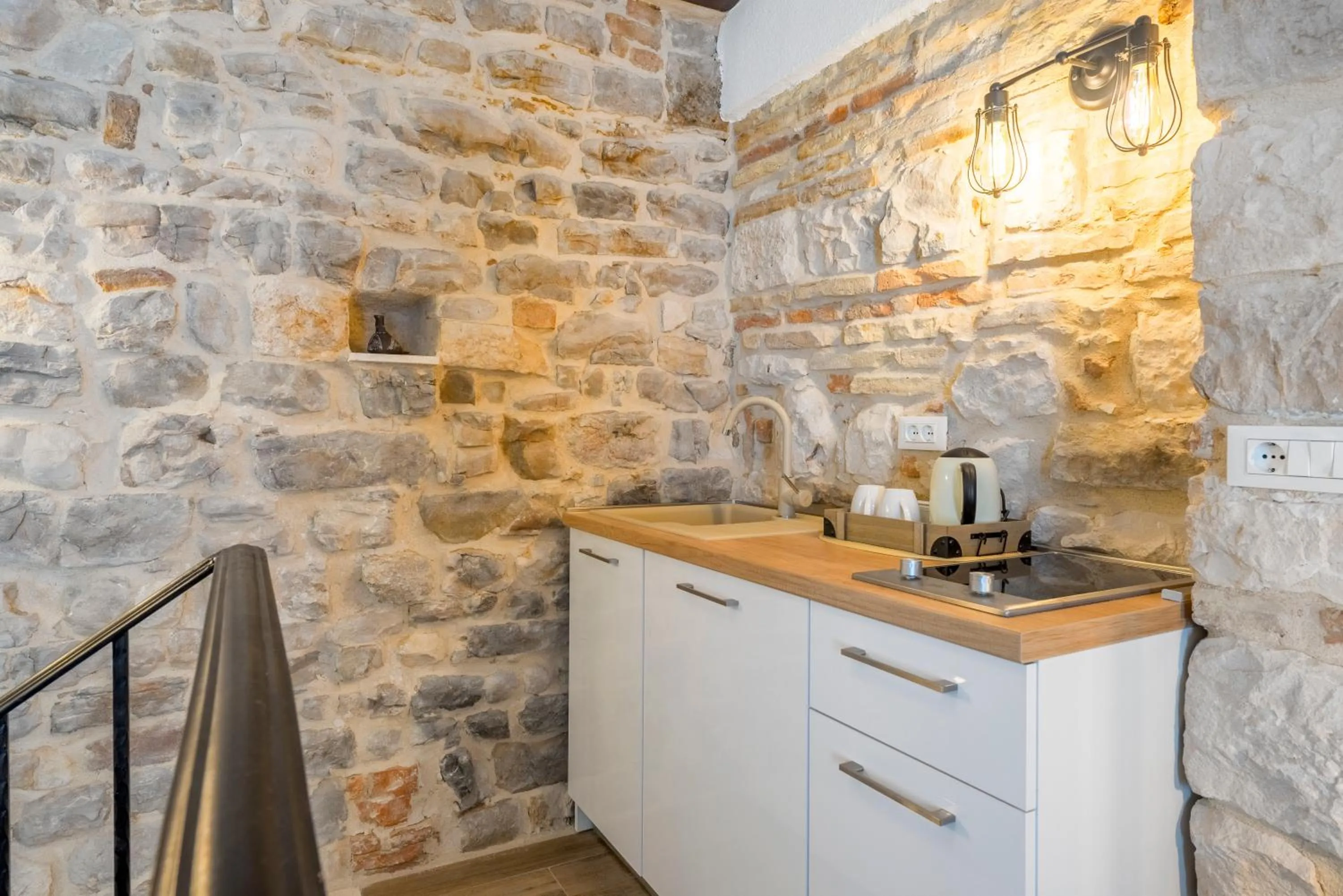 Kitchen or kitchenette in Apartments & Rooms Dujam