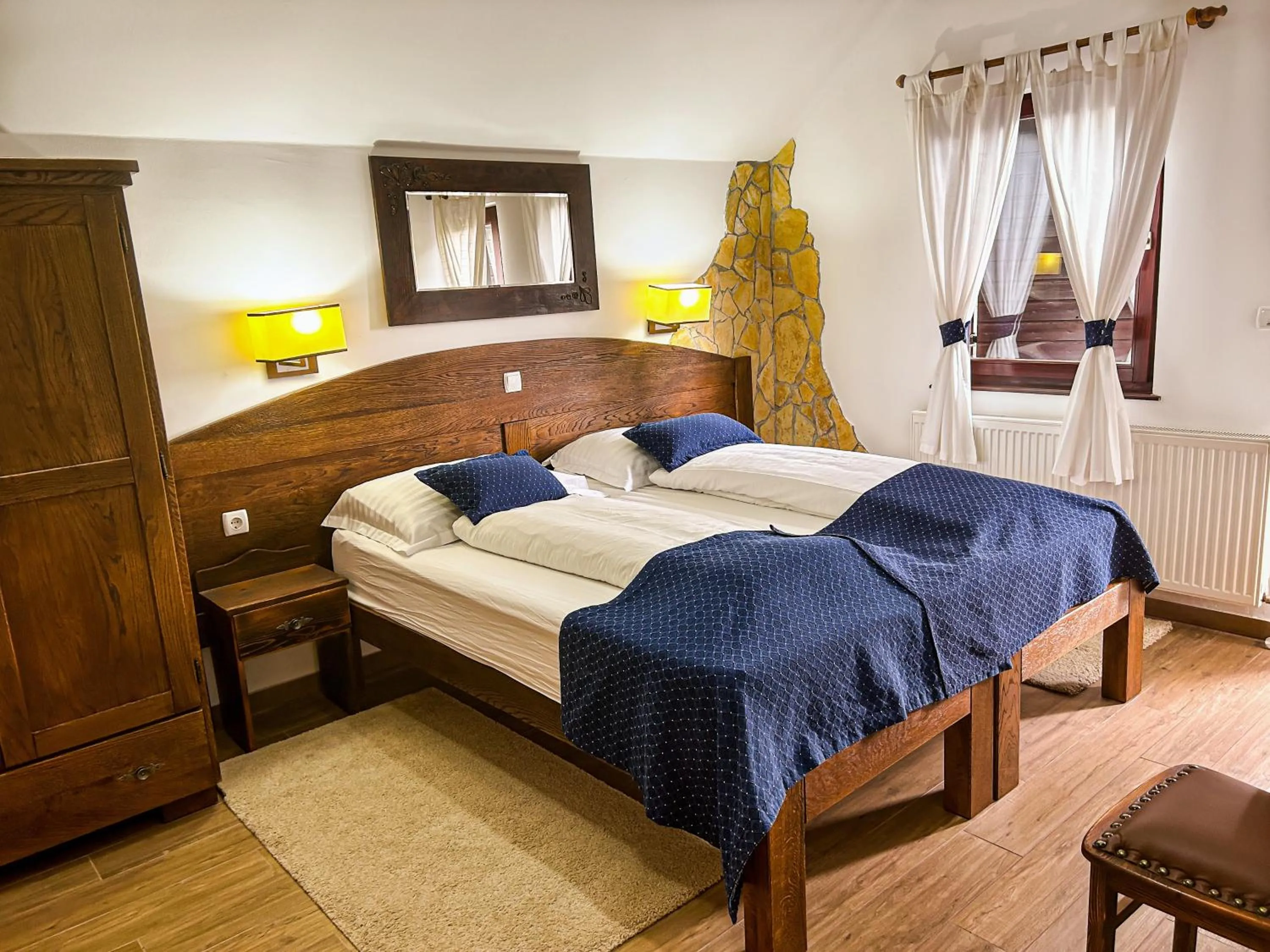 Bed in Etno Garden Apartments