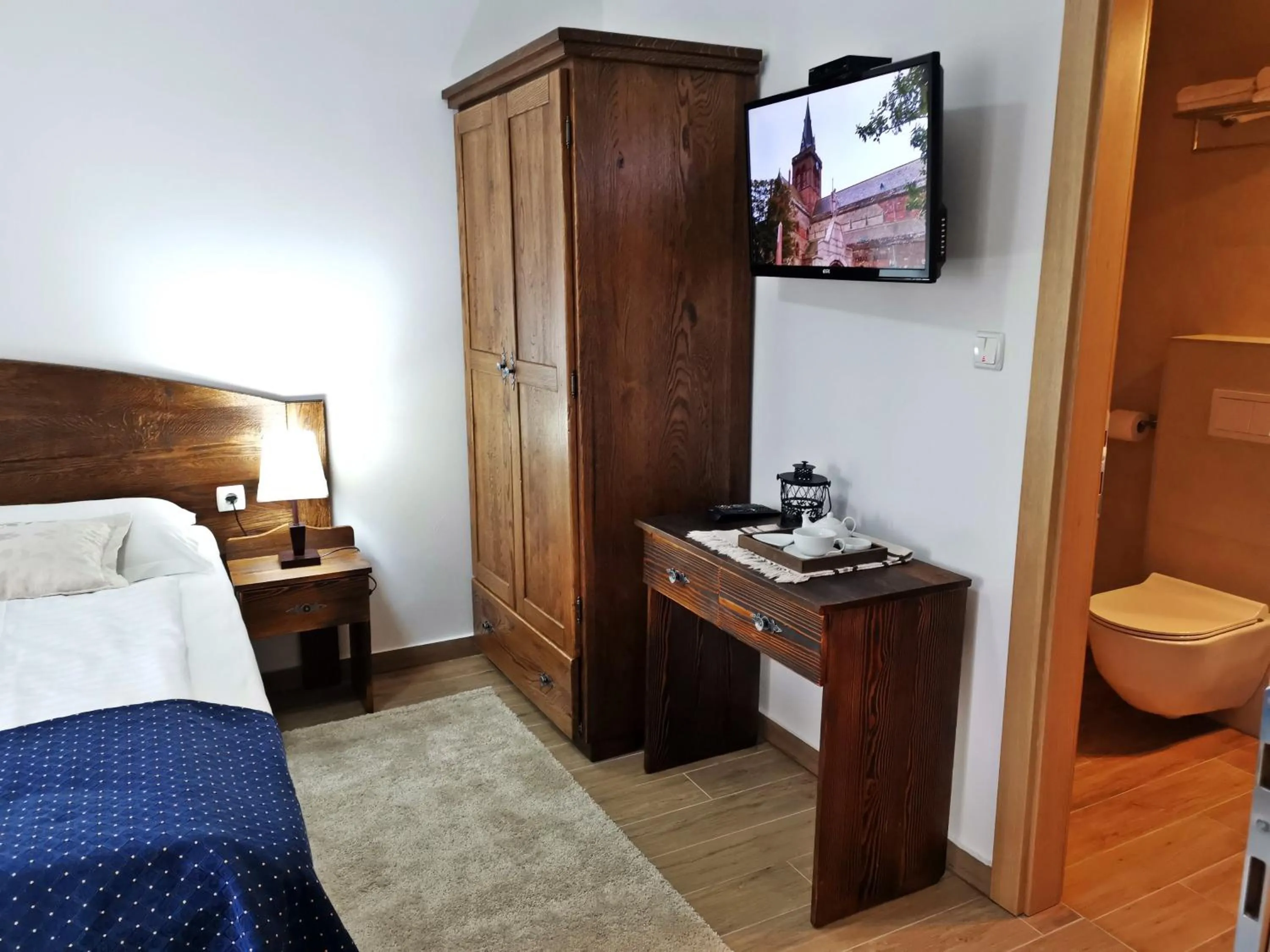 Bed in Etno Garden Apartments