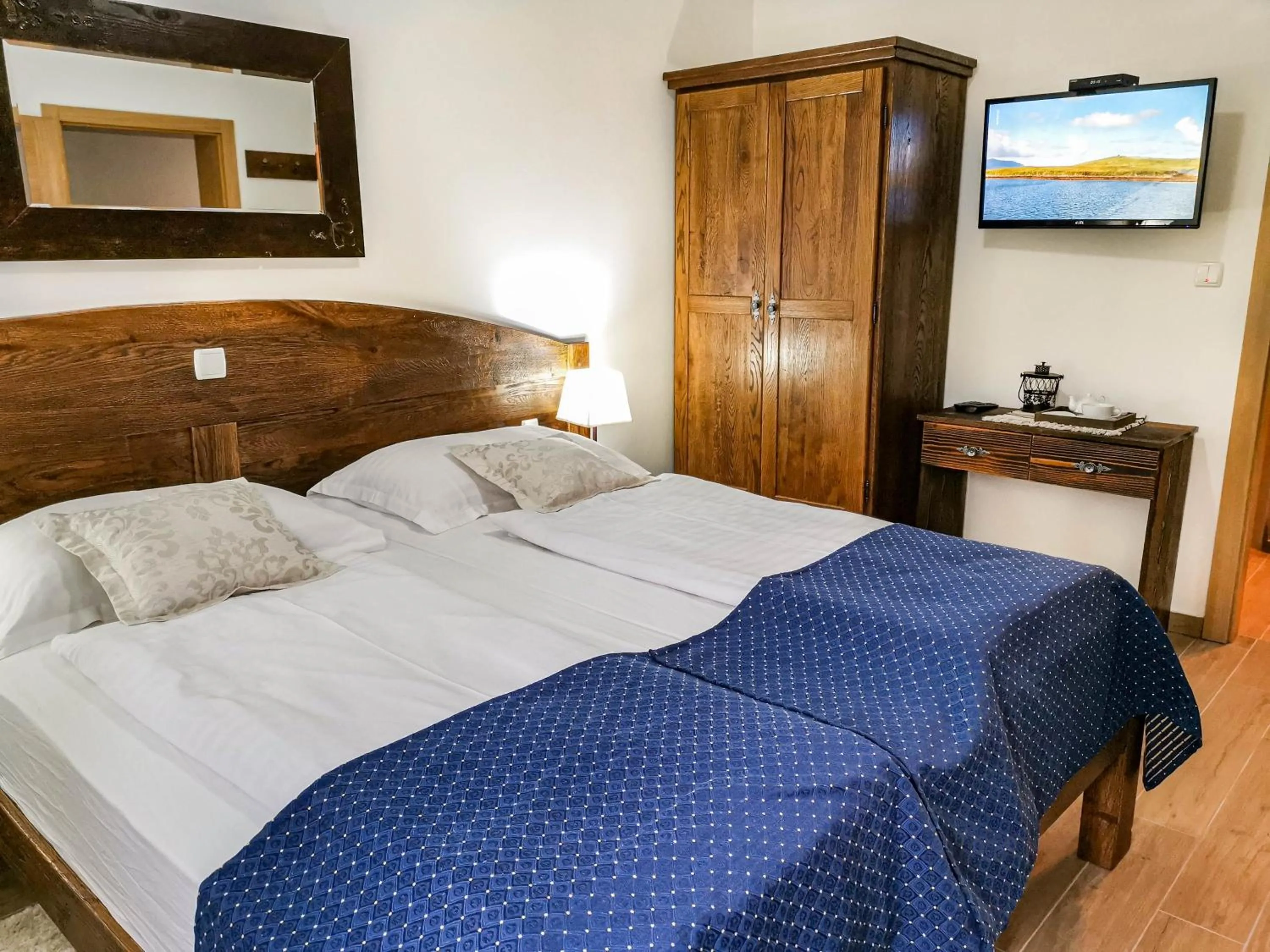 Bed in Etno Garden Apartments