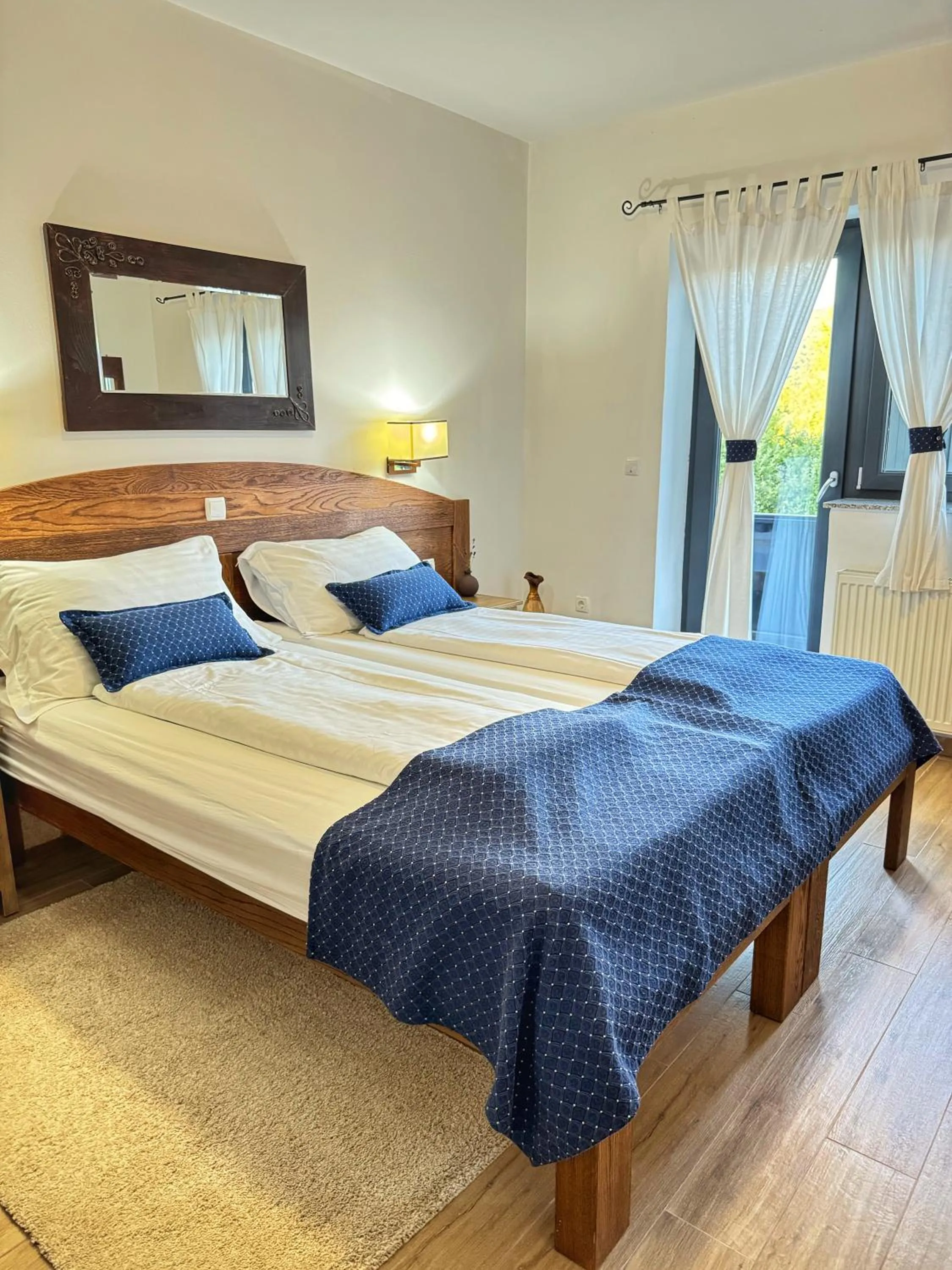 Bed in Etno Garden Apartments