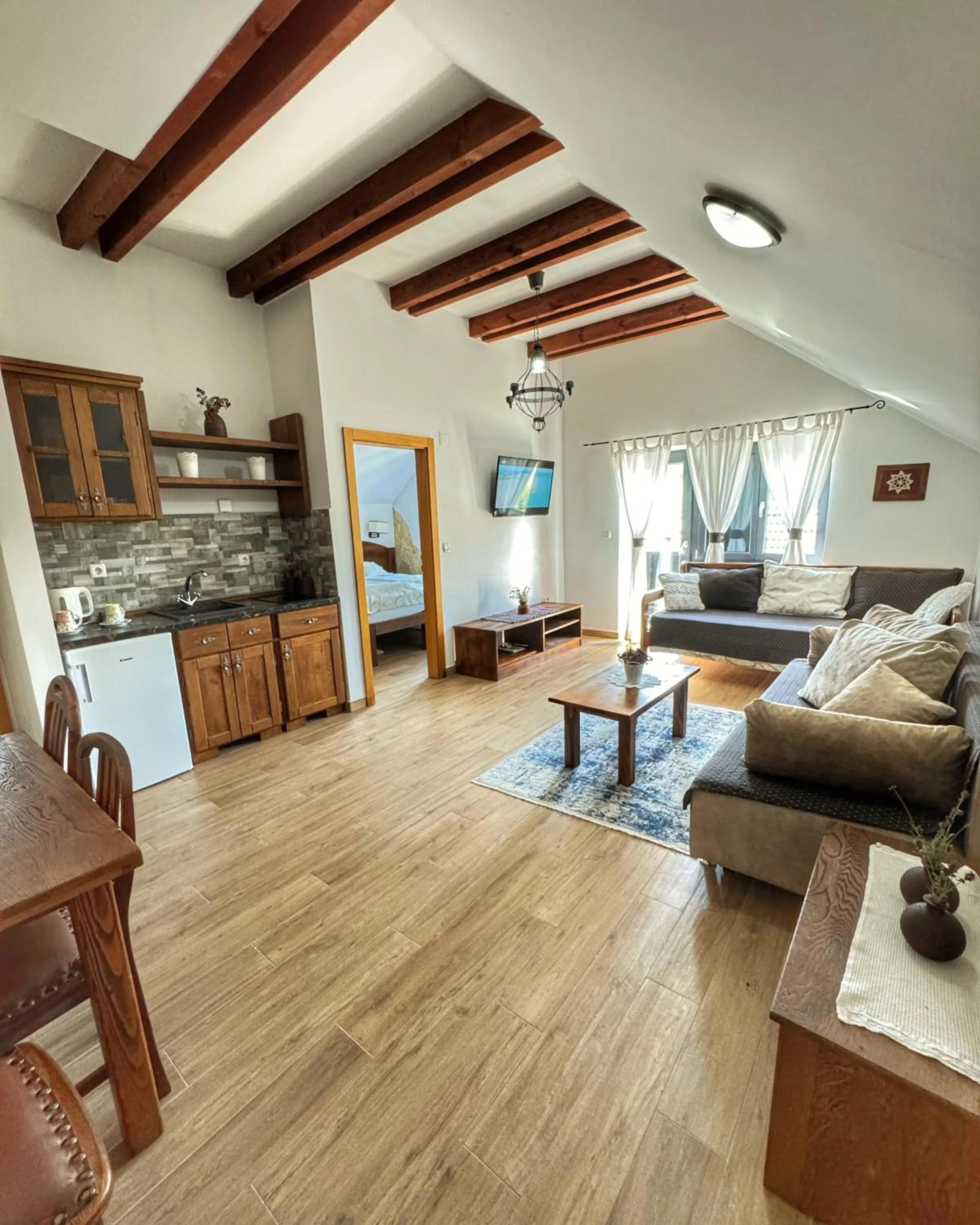 Bed in Etno Garden Apartments