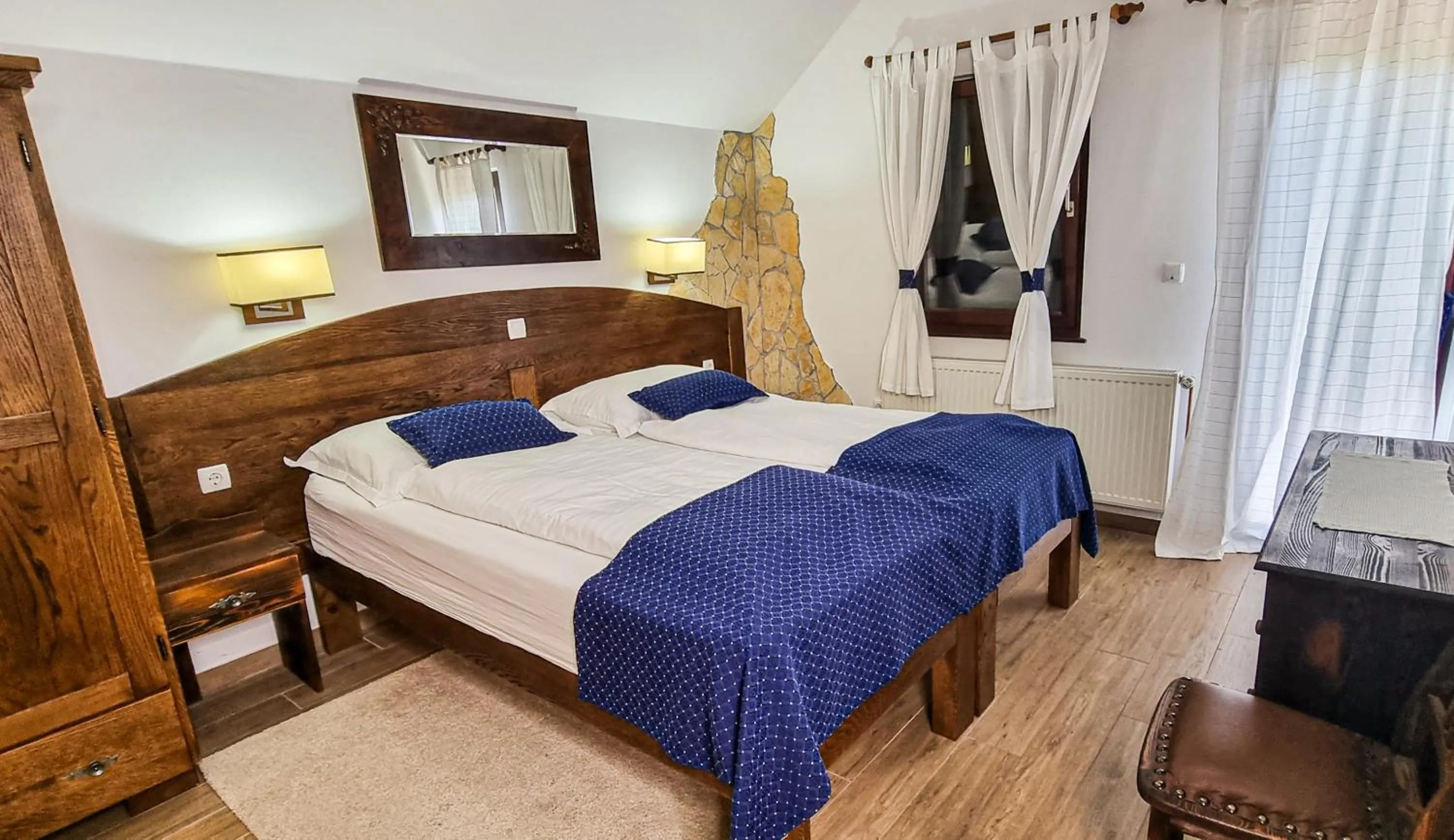 Bed in Etno Garden Apartments