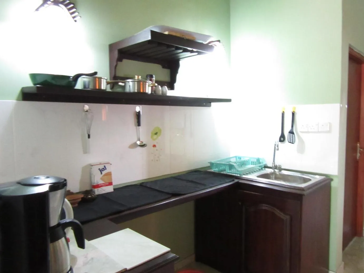 Kitchen or kitchenette in Mahi Villa