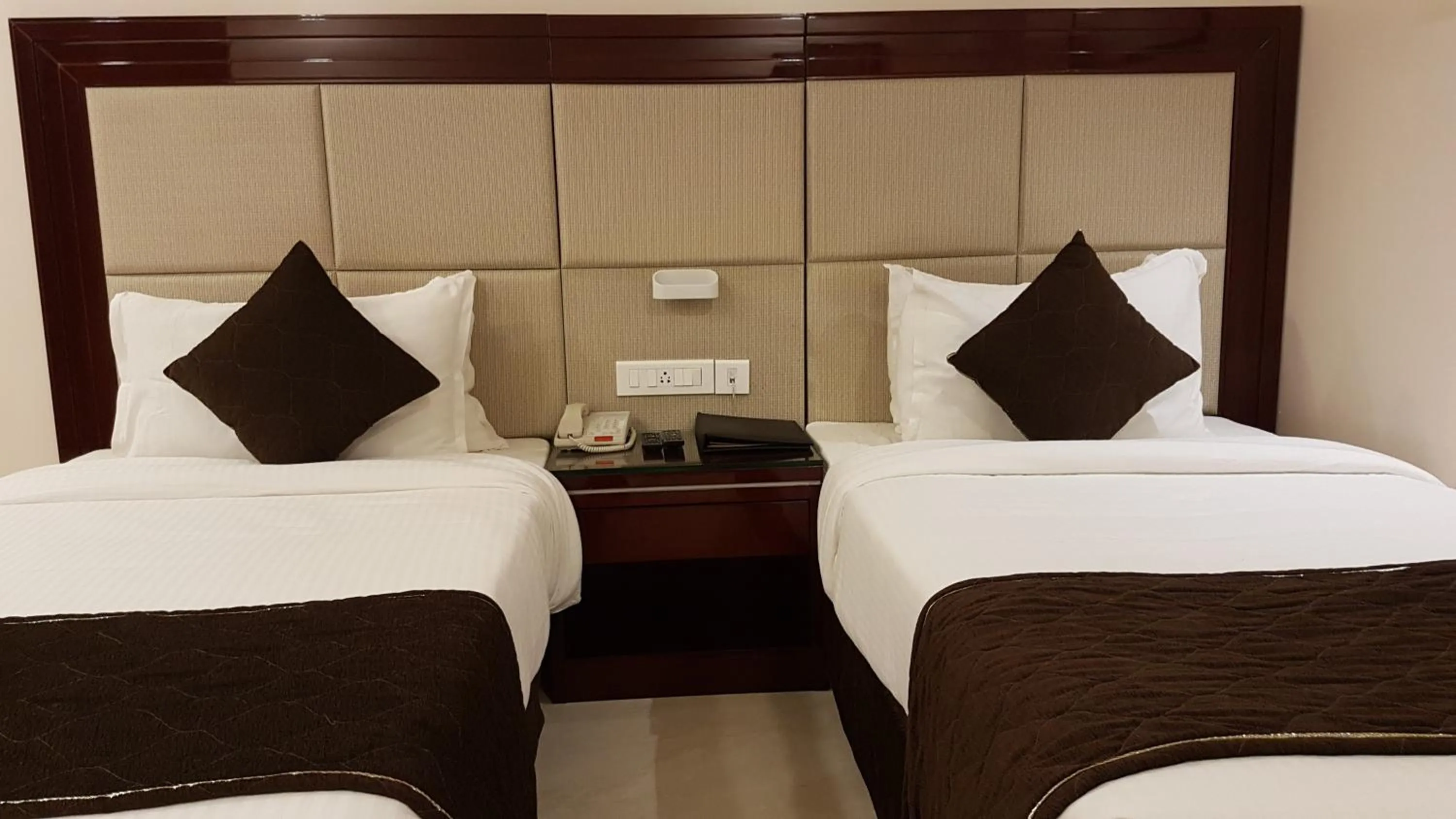 Bedroom, Bed in The AVR Hotels & Banquets