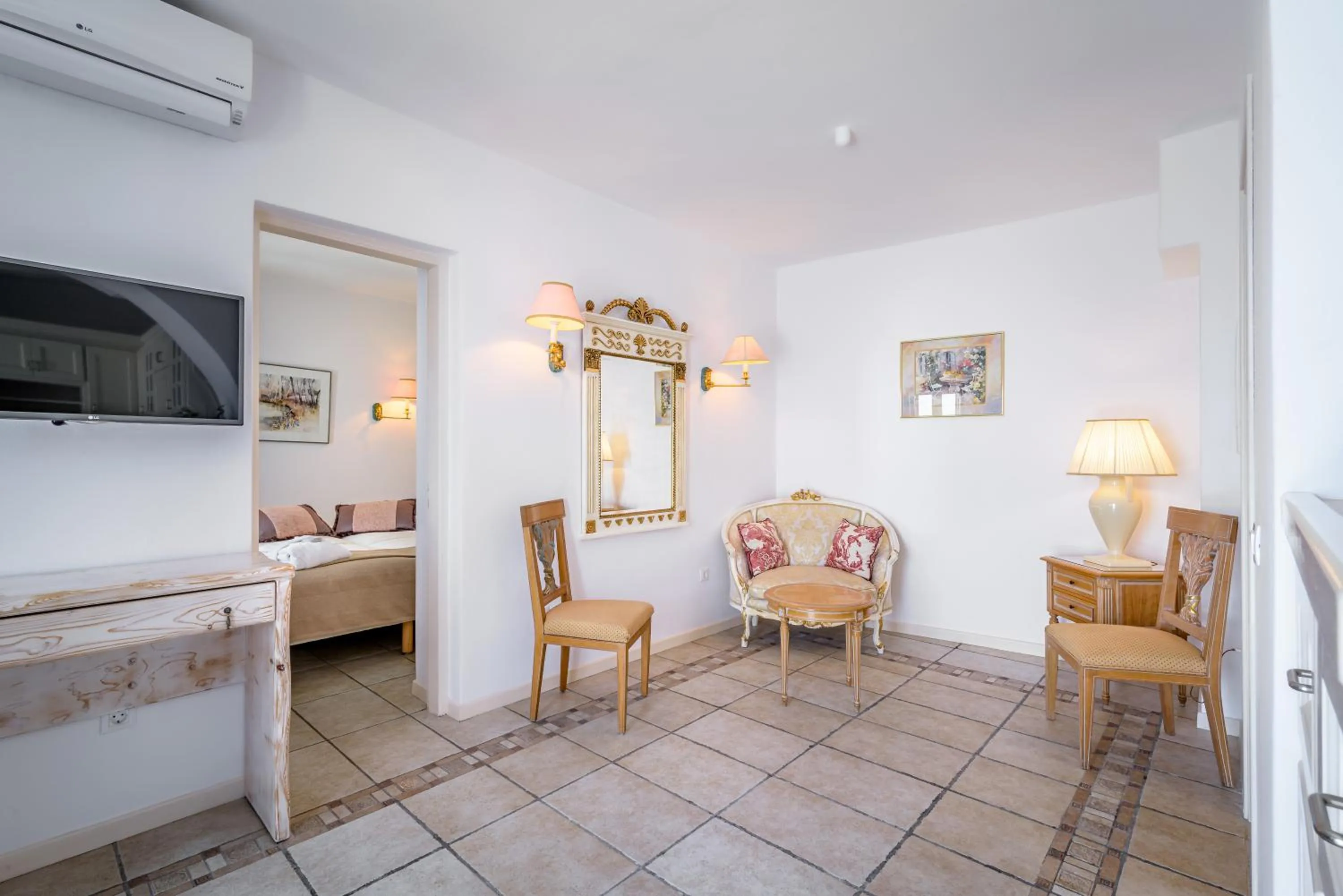 Seating area in Golden Grey Goose