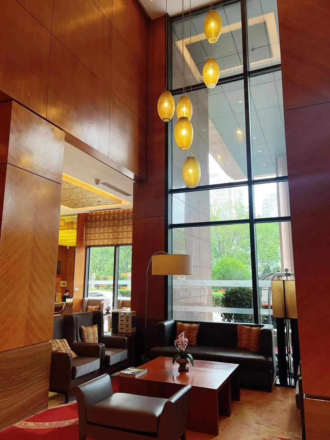 Communal lounge/ TV room in The Sandalwood Beijing Marriott Executive Apartments