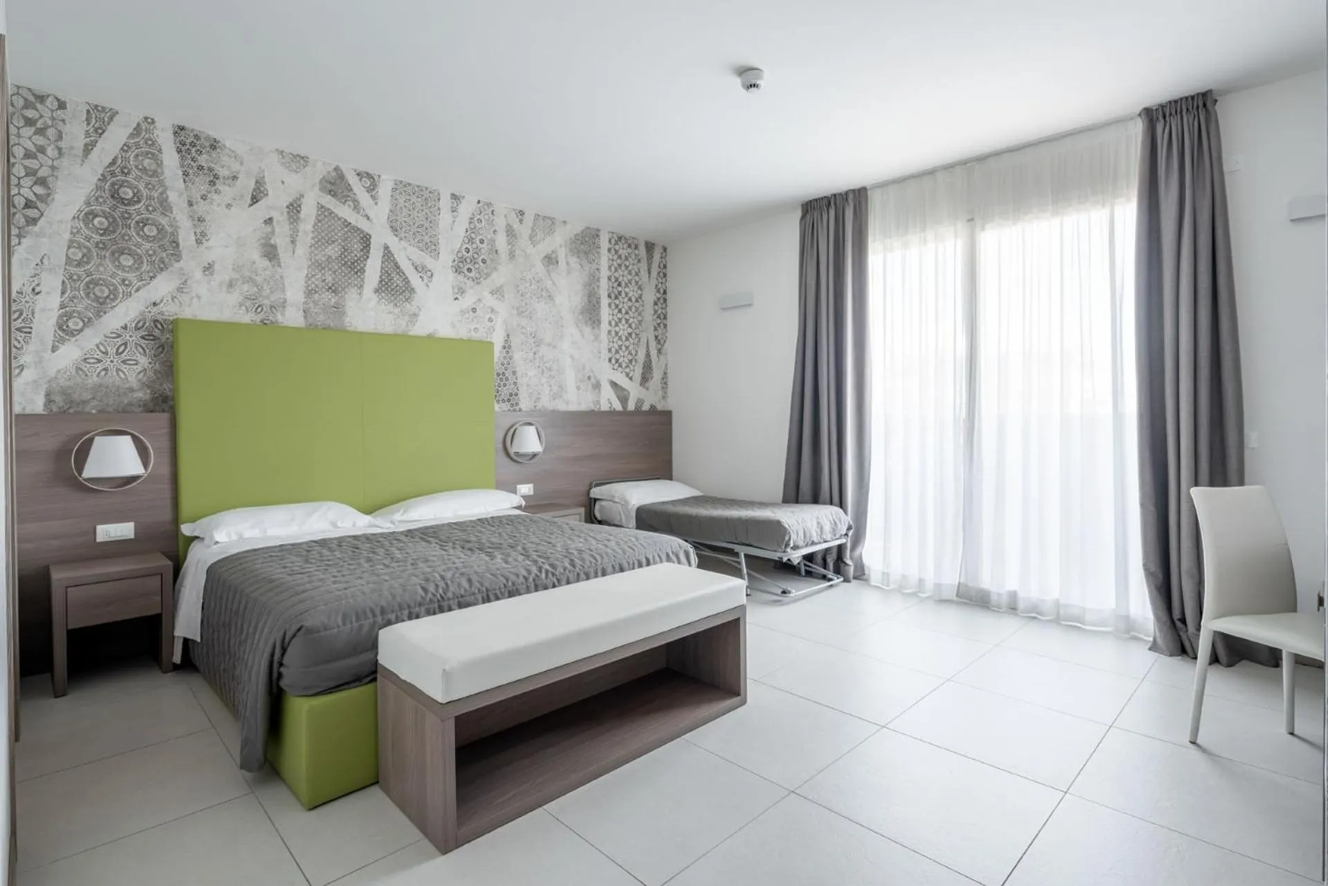 Bed in Hotel Iris Jesolo