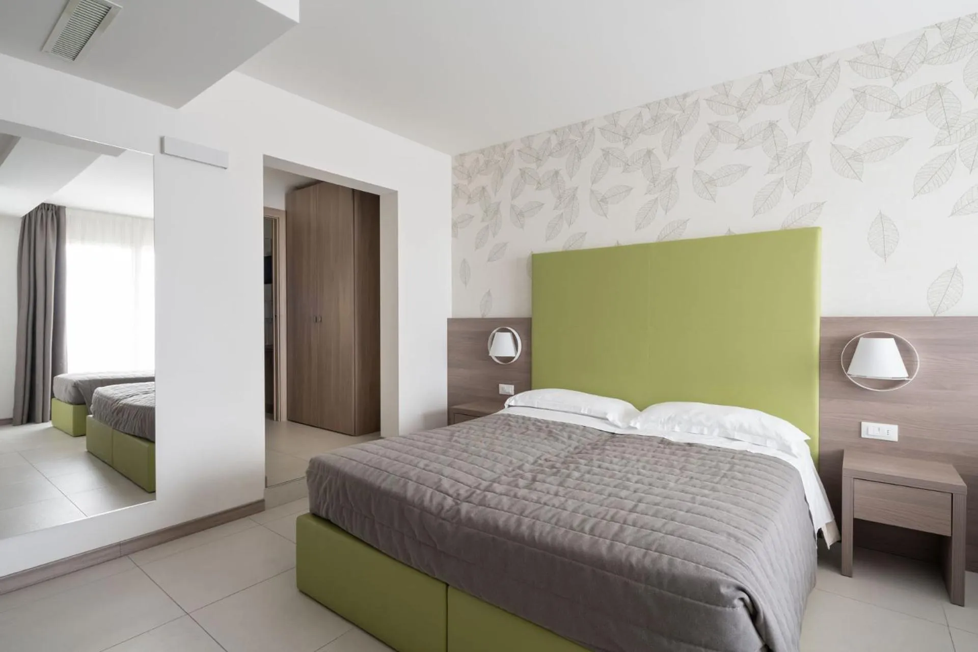 Bed in Hotel Iris Jesolo