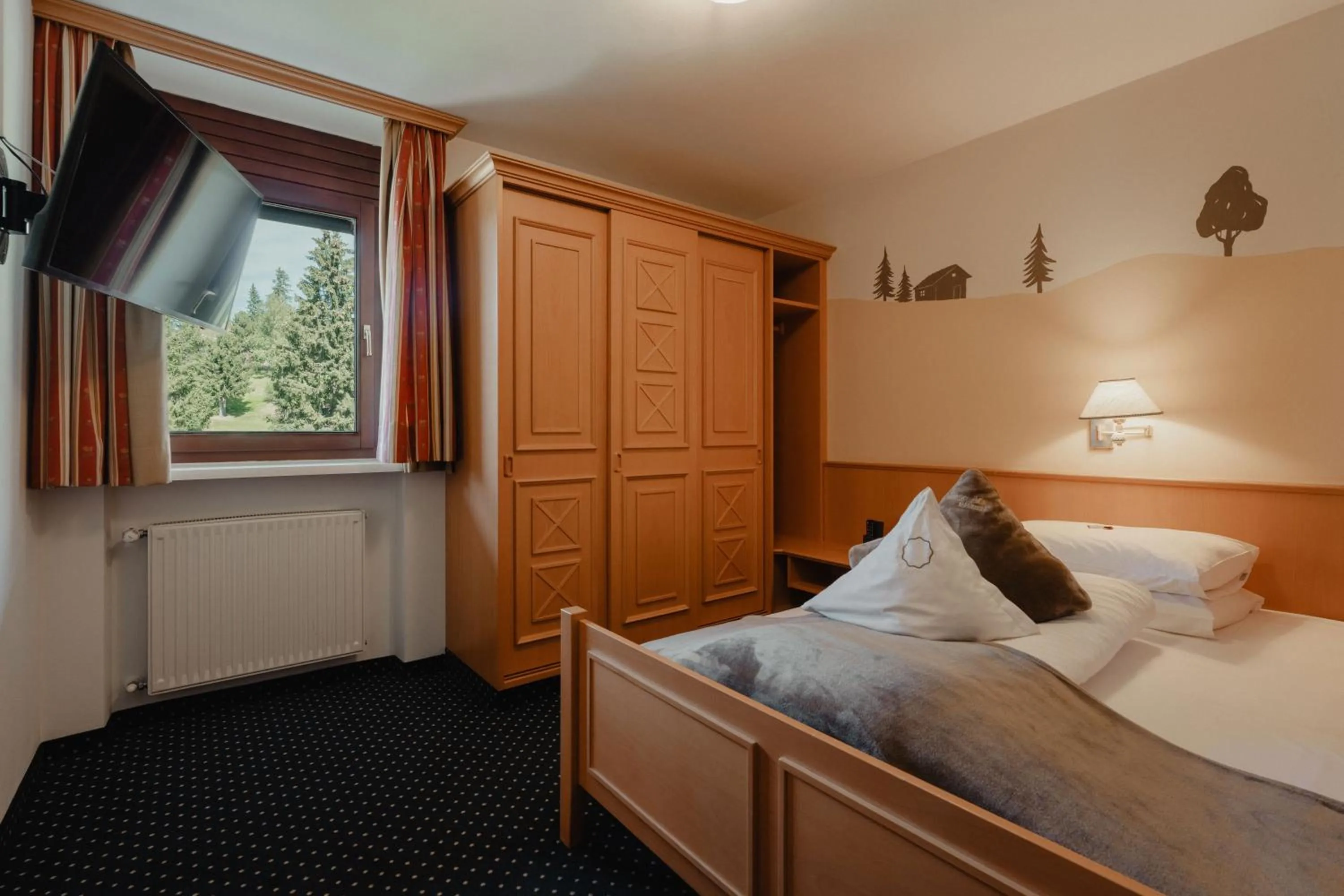 Bed in Hotel Alpenrose