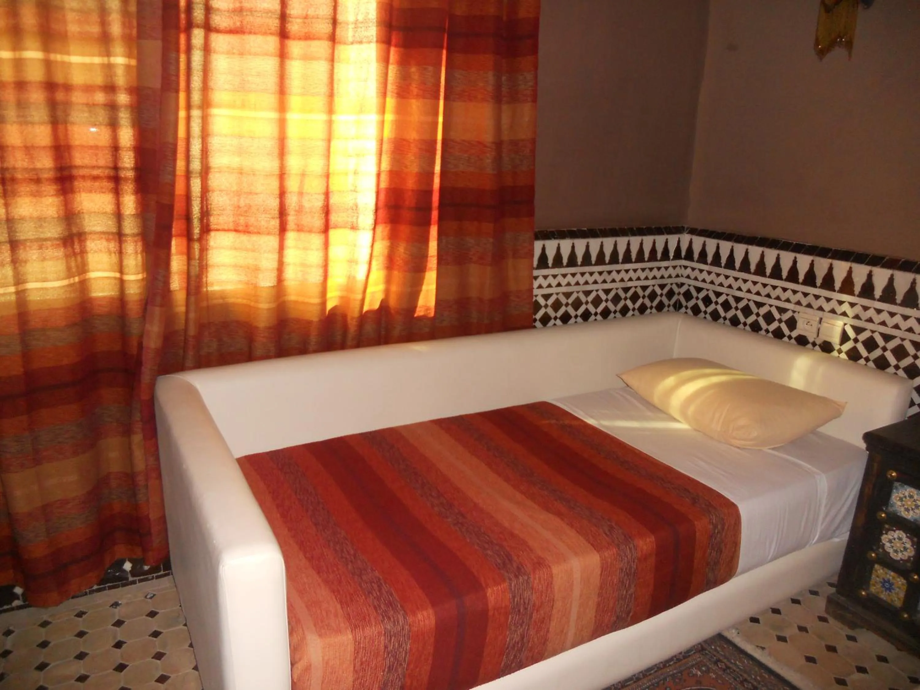 Bed in Riad Passiflora