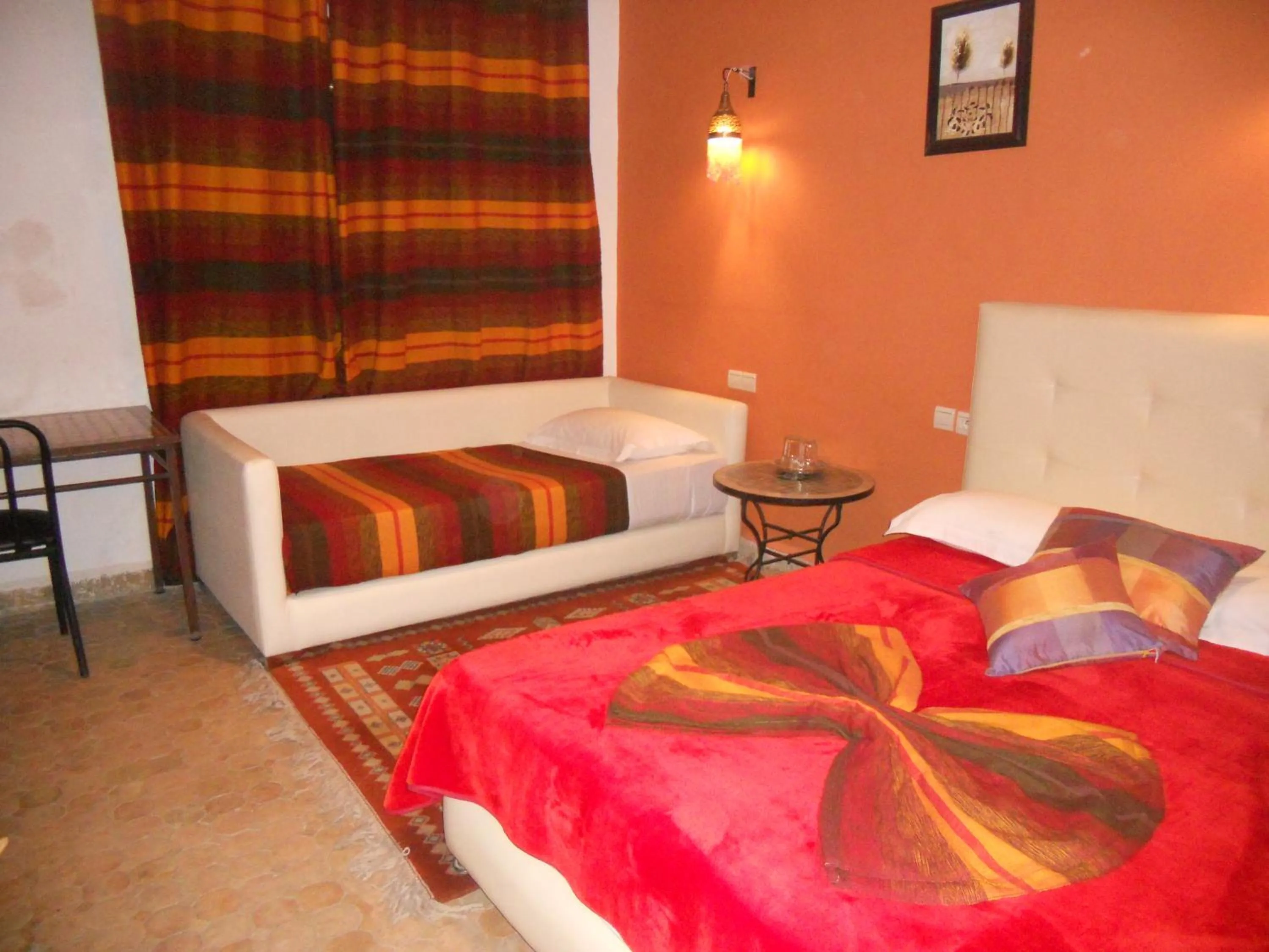 Bed in Riad Passiflora