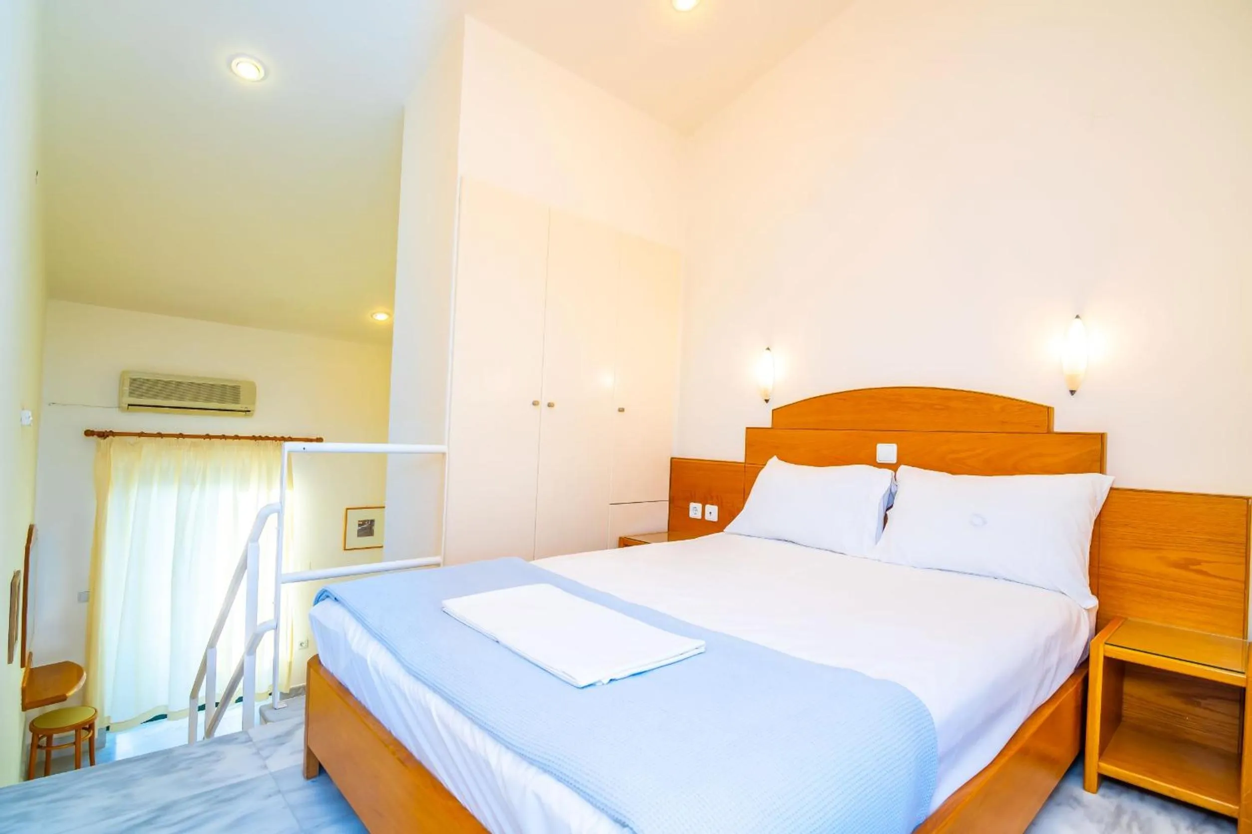 Bed in Orestis Hotel Sea View Apartments