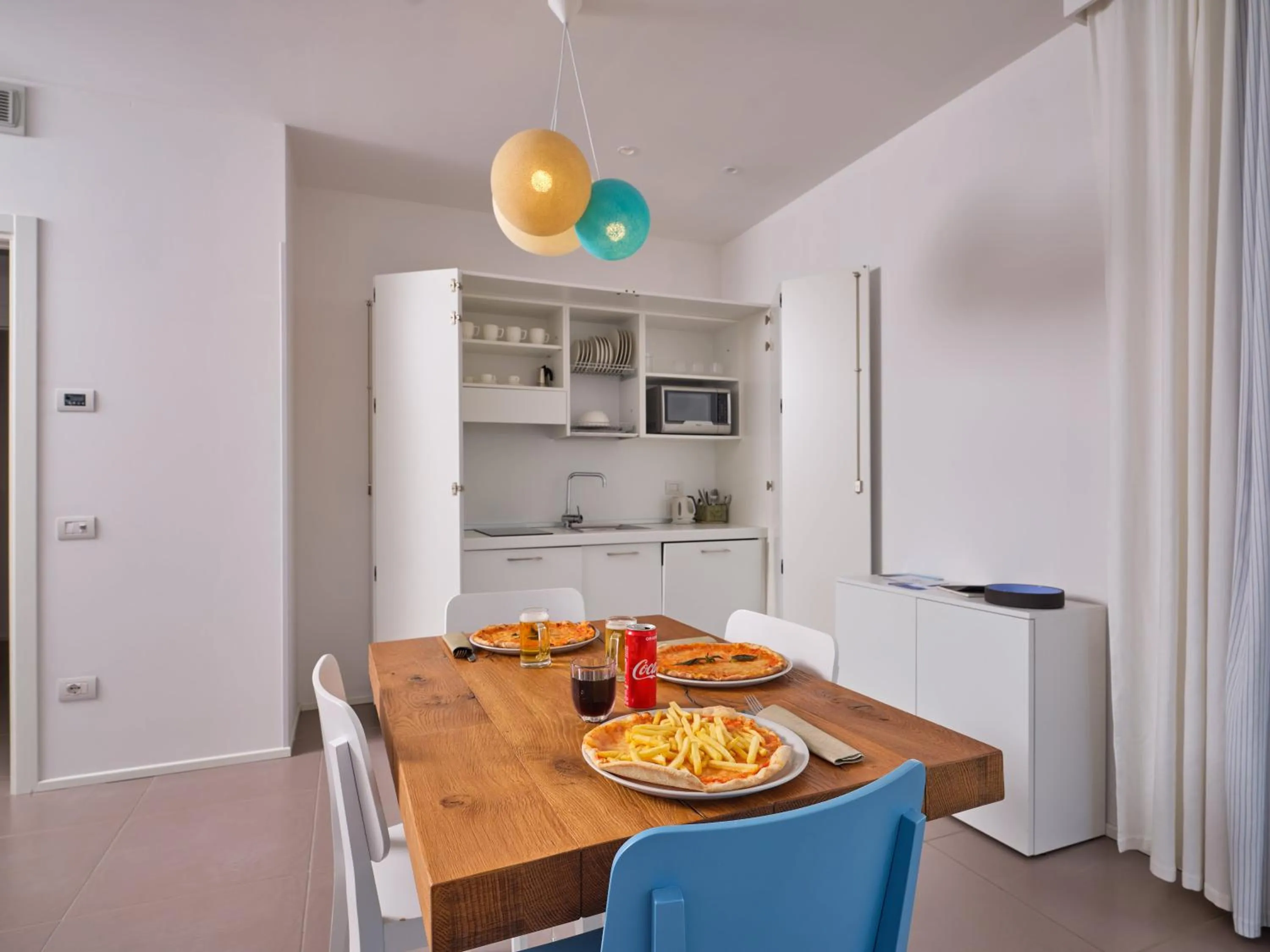 Kitchen or kitchenette in Felix Hotels - Hotel Residence Porto San Paolo