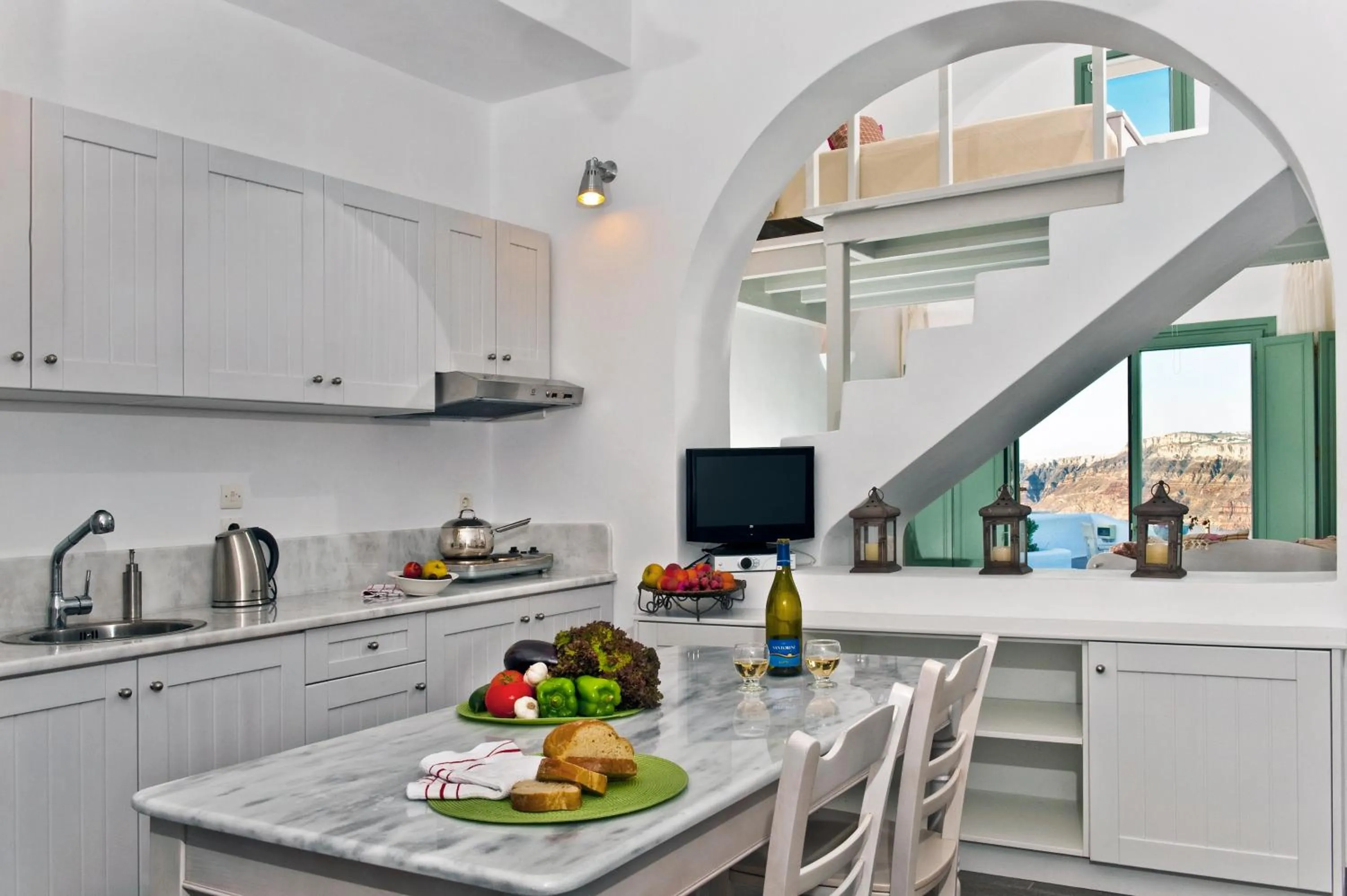 TV and multimedia in Aura Marina Apartments Santorini