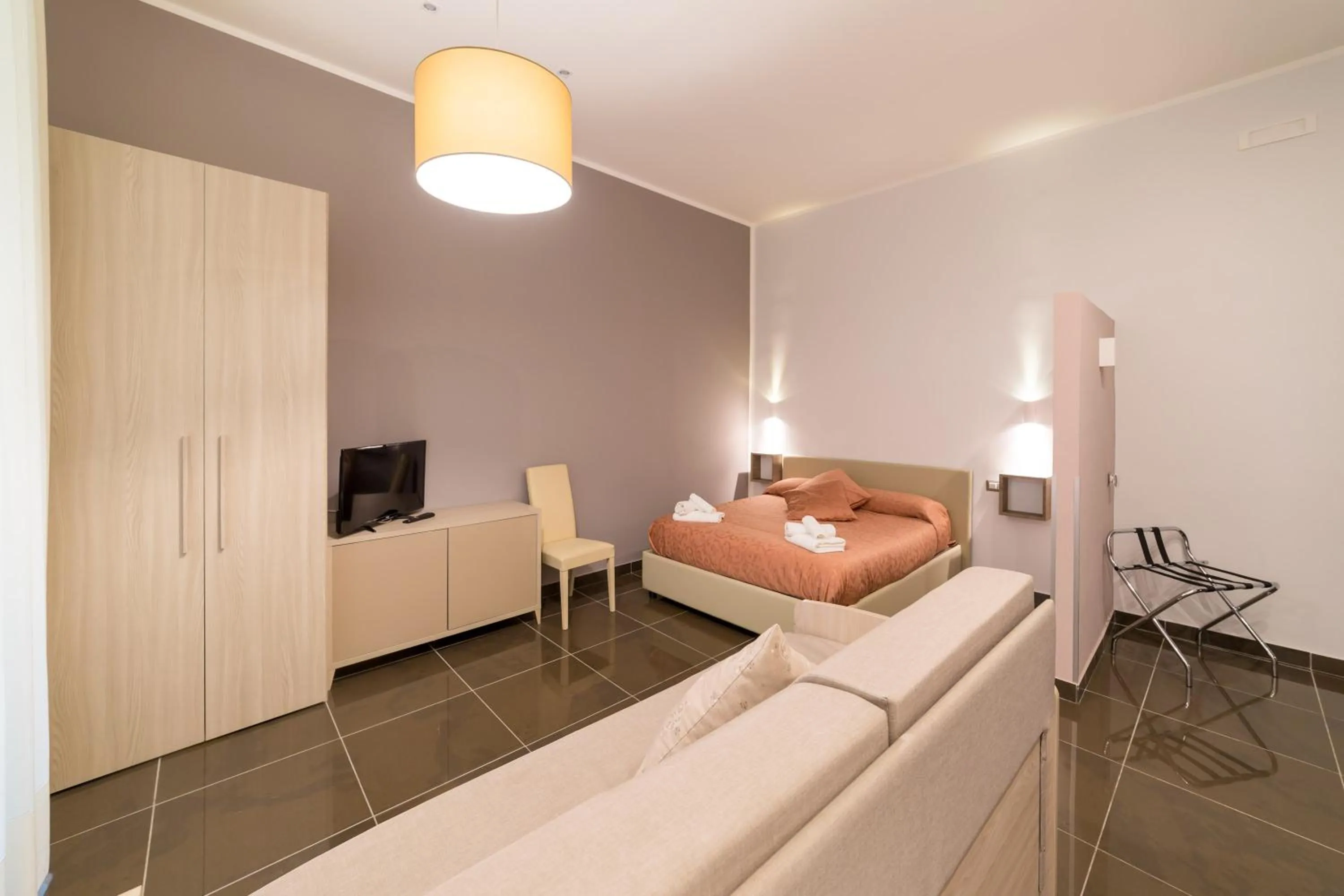 Bed in Be Italian Flat Bovio