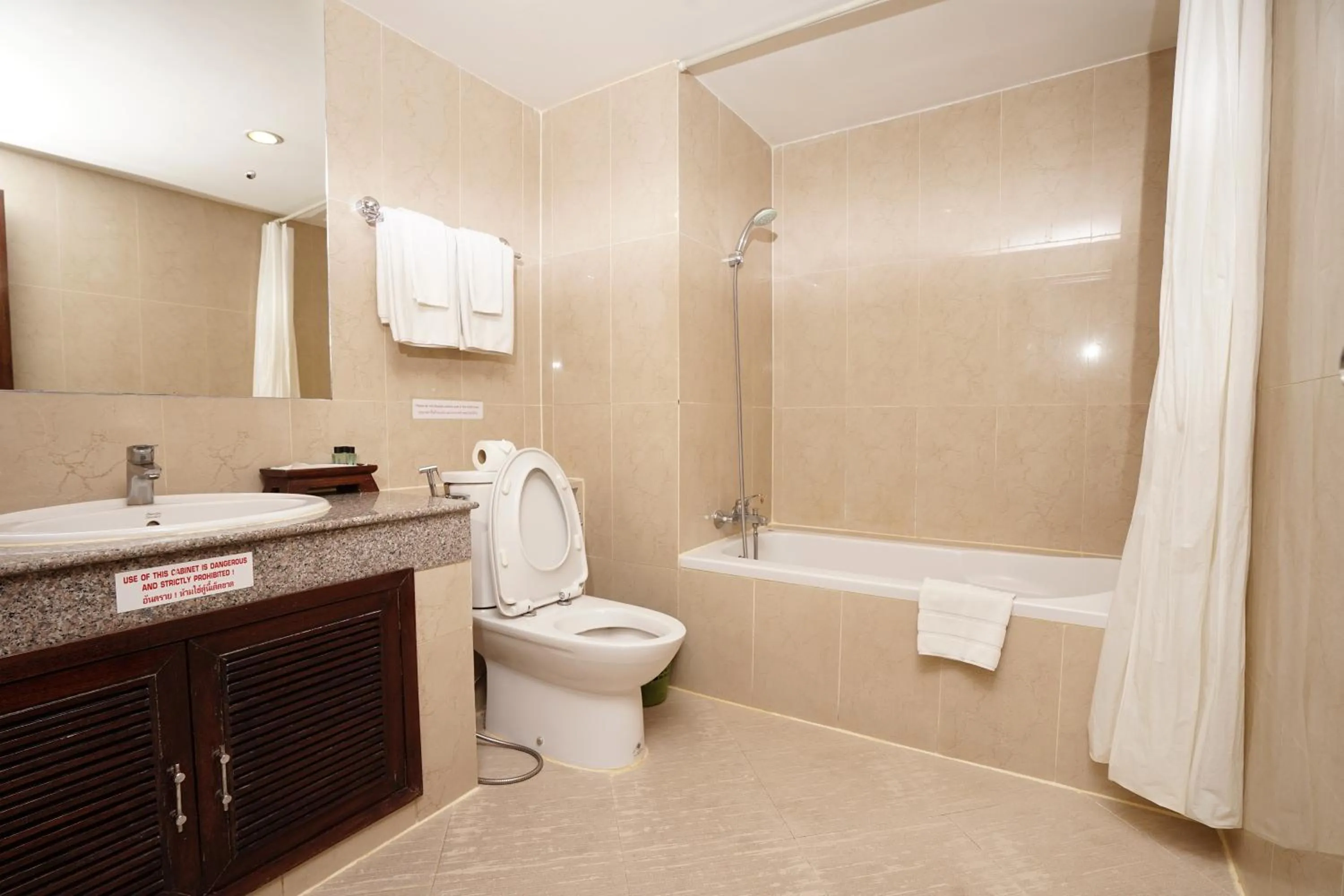 Toilet in Grand Business Inn