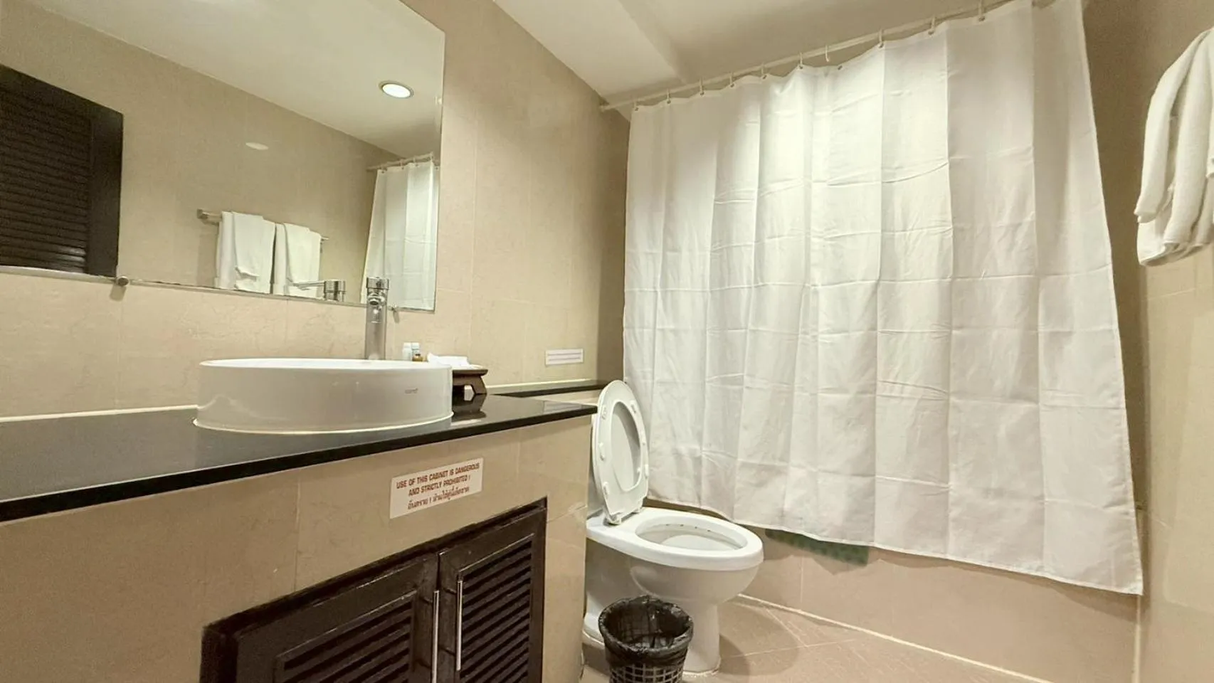 Toilet in Grand Business Inn