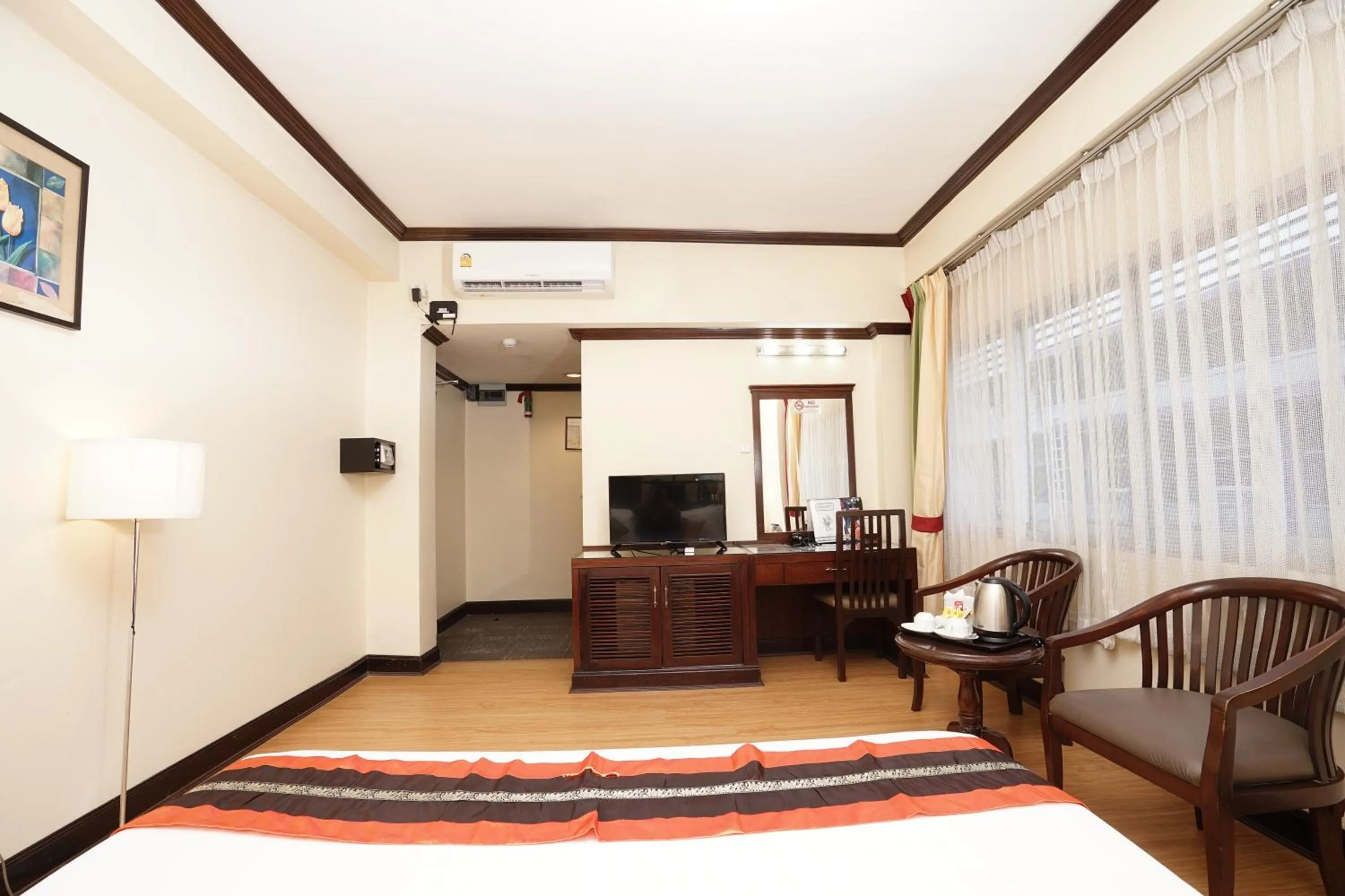 Bedroom in Grand Business Inn